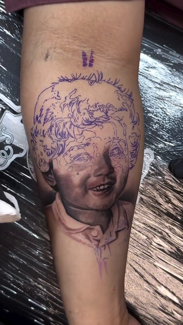 Child portrait realism tattoo by Luis Rodriguez