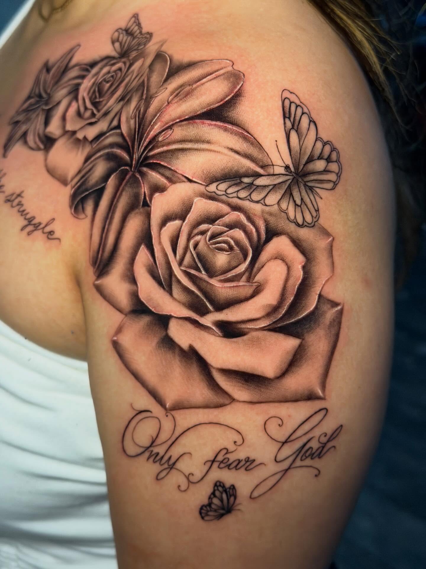 Rose and butterflies realism tattoo on the shoulder by Dany