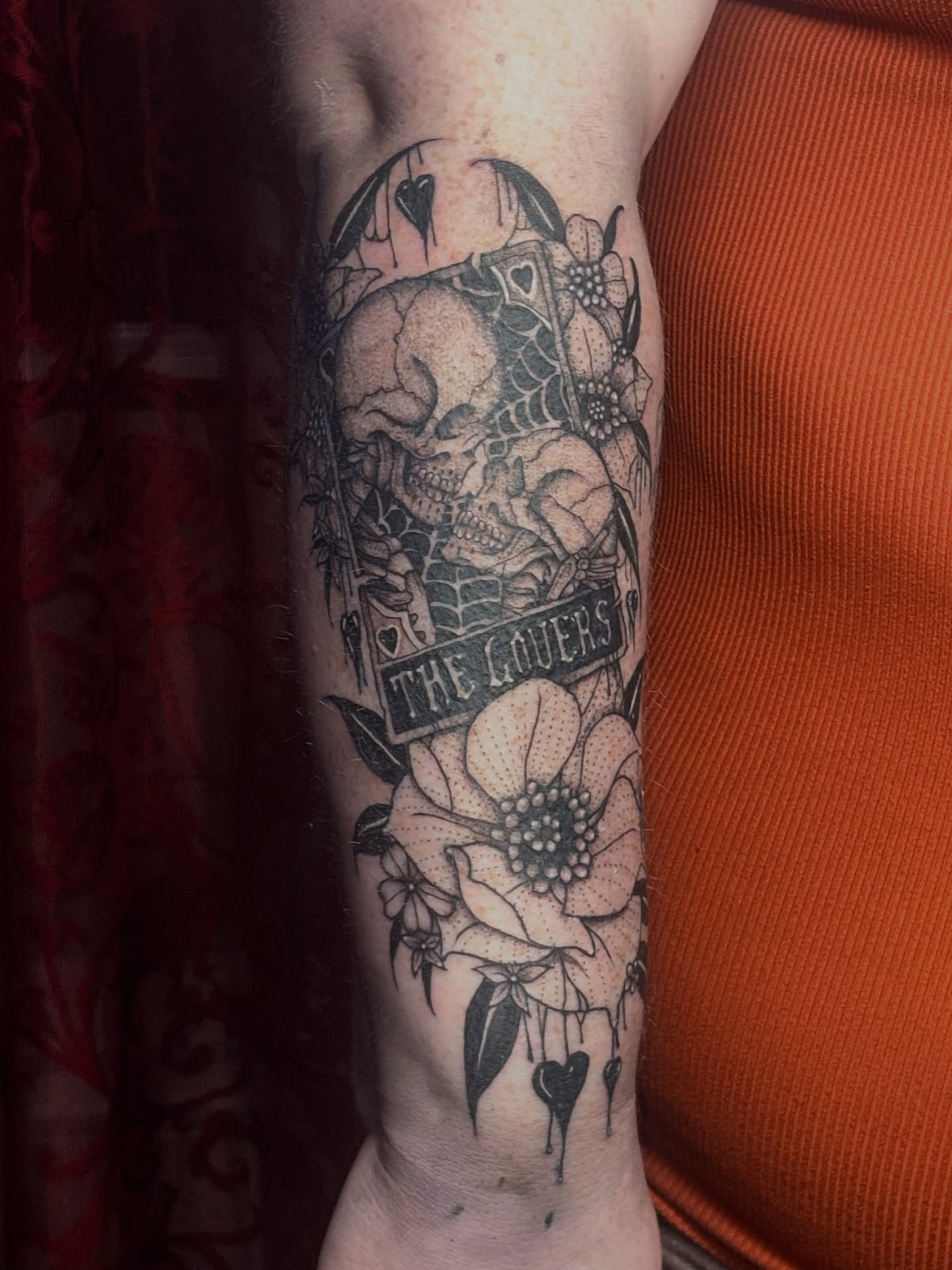 Skull and flowers dotwork tattoo on the forearm by 𝔾𝔥𝓸ş𝔱