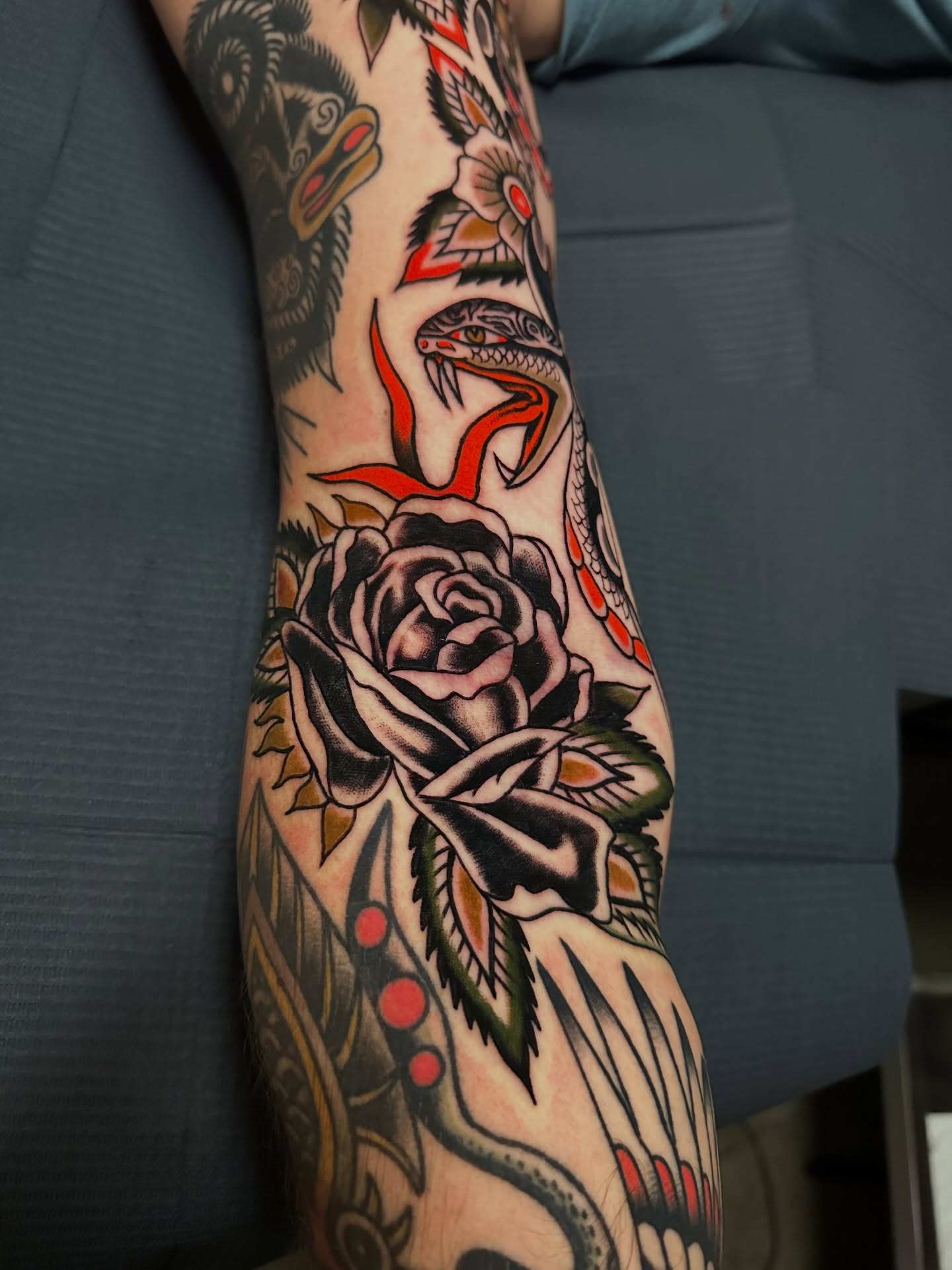 Rose and snake American traditional tattoo on the forearm by A.j. Lingerfeldt, Nashville, Tennessee