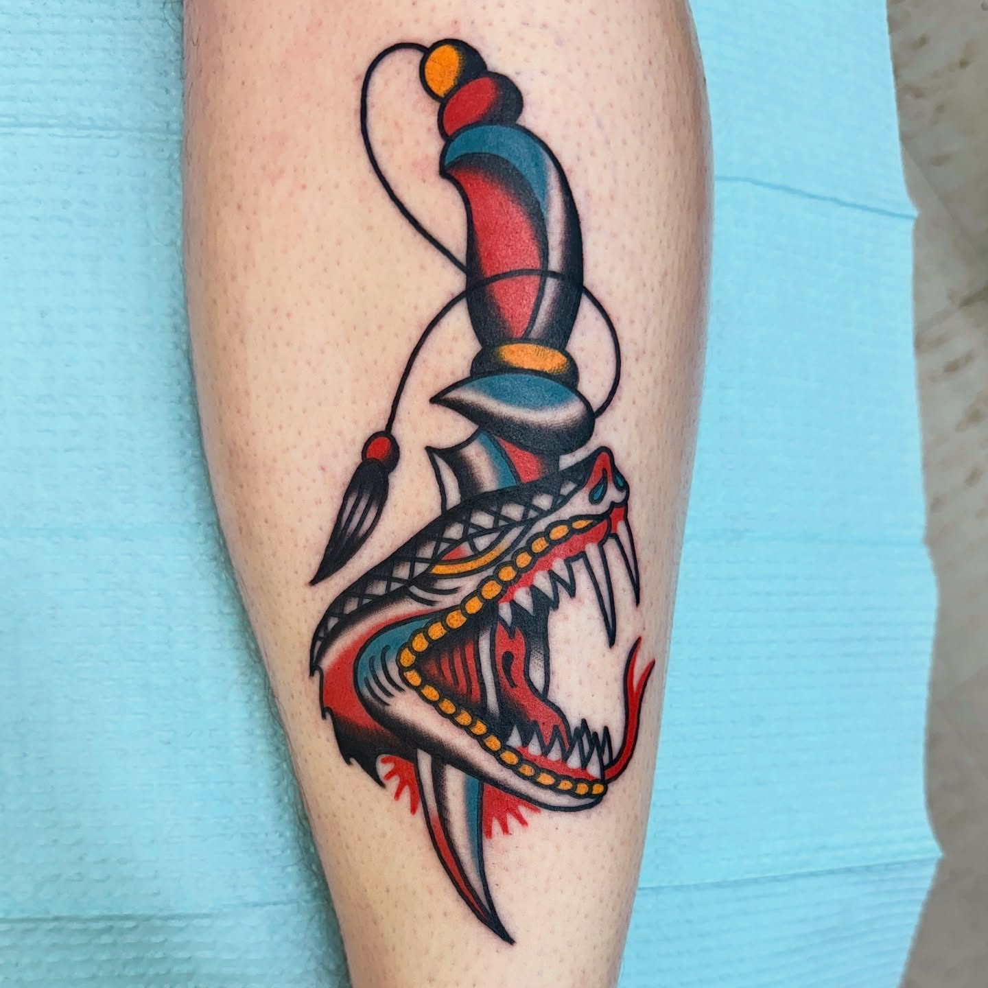 Fish American traditional tattoo on the forearm by Sam