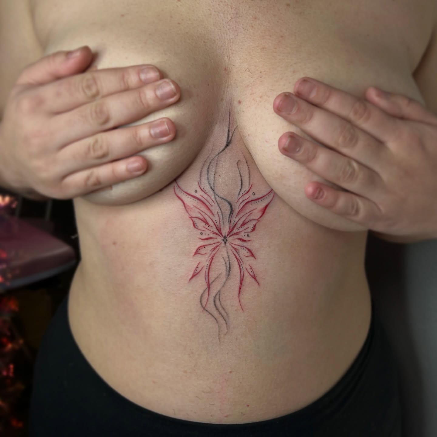 Abstract floral design dotwork tattoo on the torso by @tattoosbyskyeee