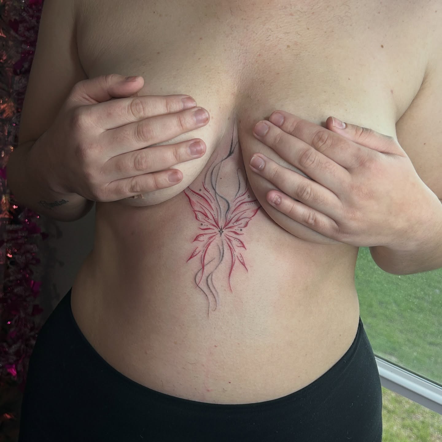 Flower fine line tattoo on the chest by @tattoosbyskyeee