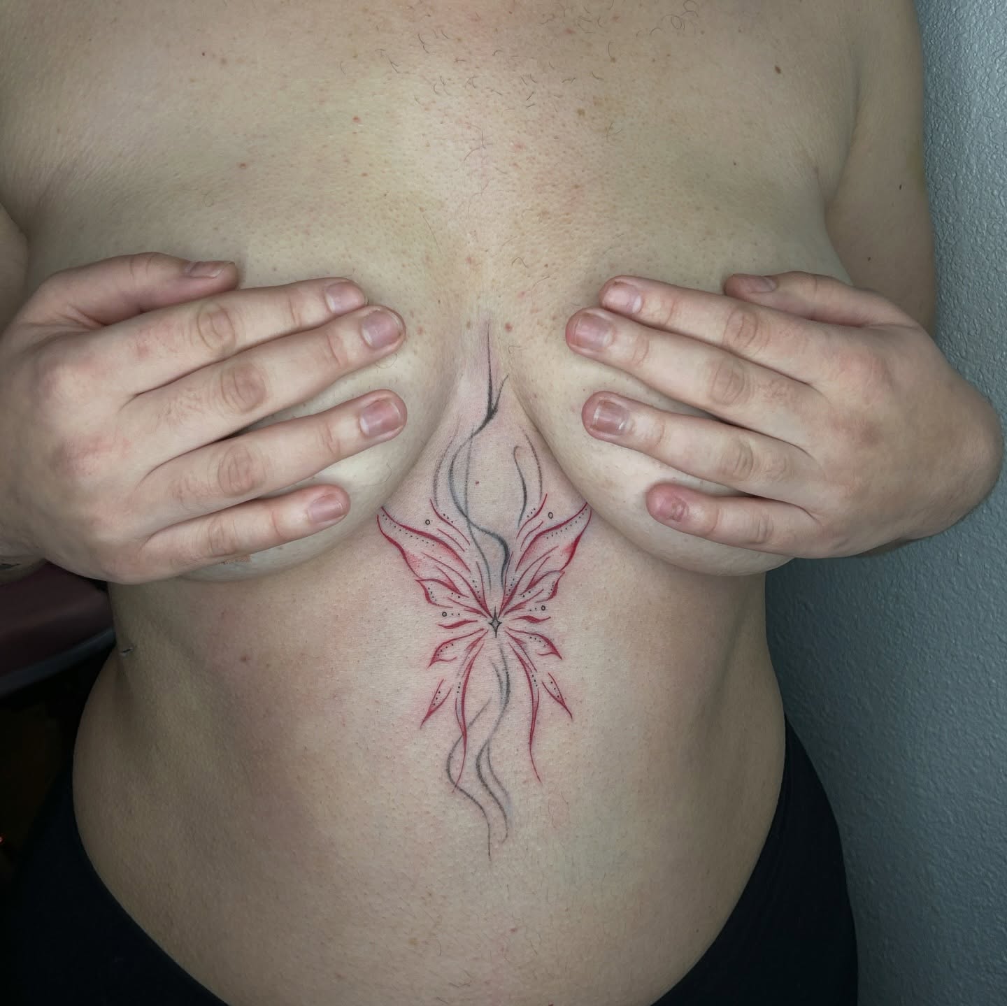 Floral design dotwork tattoo on the chest by @tattoosbyskyeee