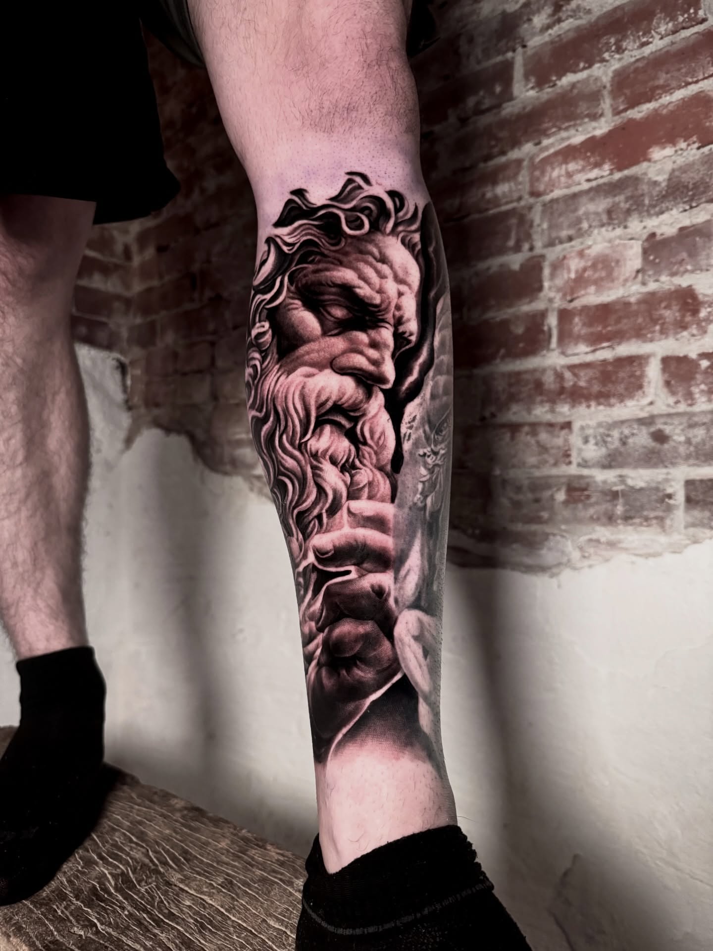 Bearded man realism tattoo on the forearm by Yudel