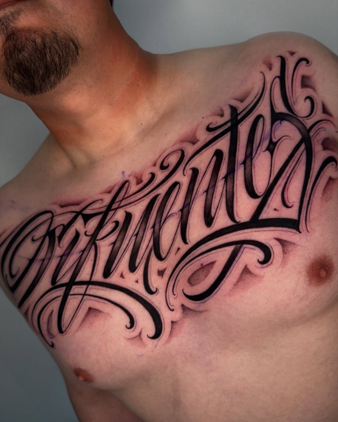 Script lettering lettering script tattoo on the chest by Chicanocustomlettering