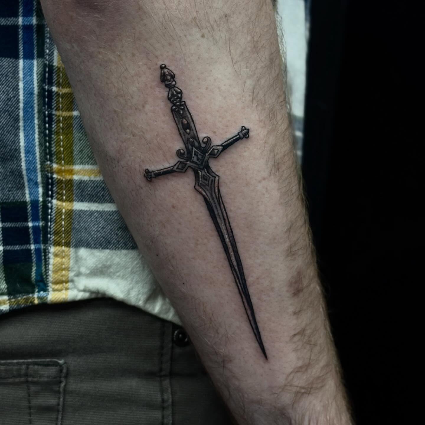 Sword black and grey tattoo on the forearm by ππ©π’π΅ππ«π‘π―π ππ¬π«π’π°