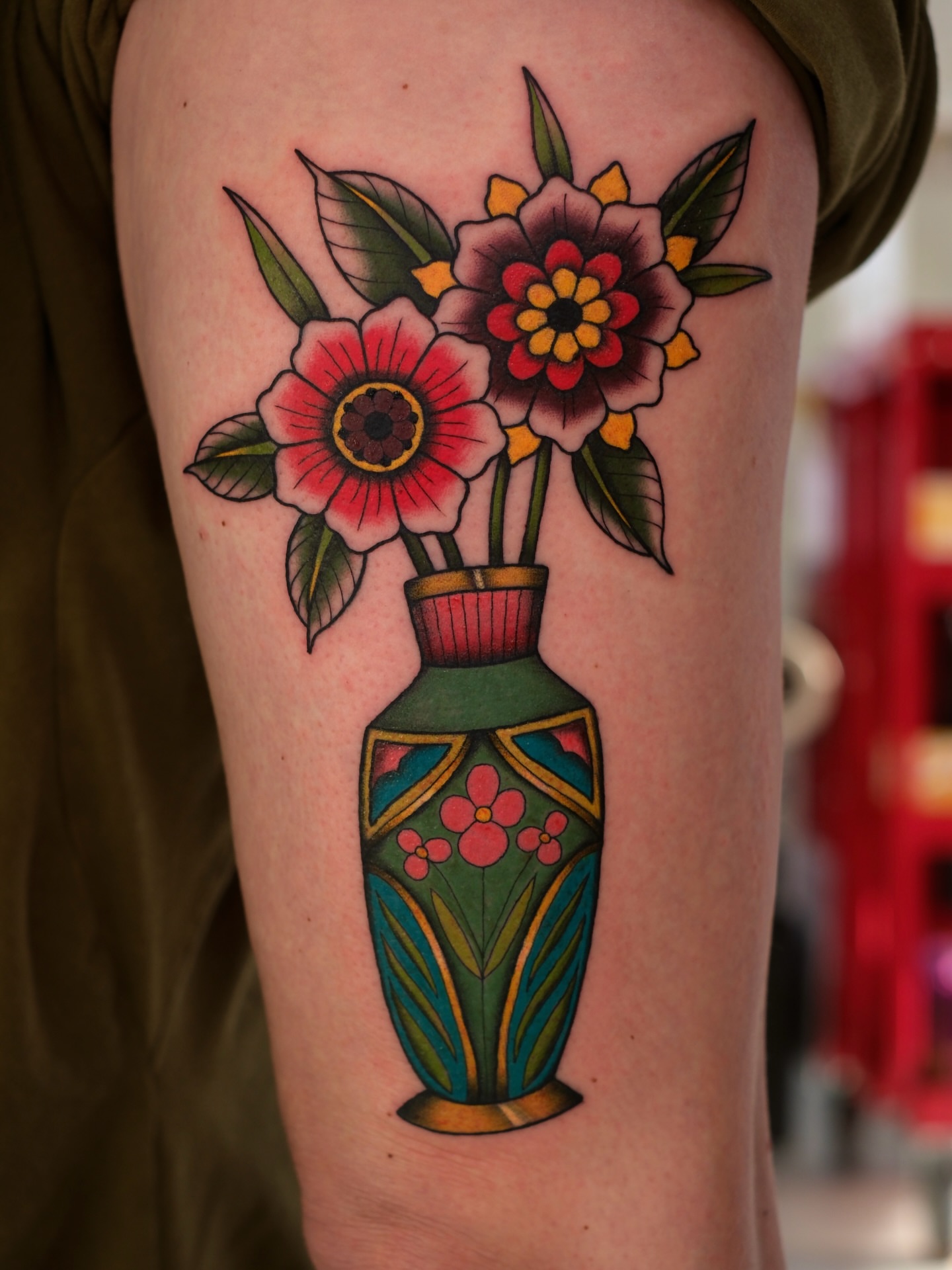 Flowers in vase American traditional tattoo on the forearm by Mallory Murphy, Denton, Texas