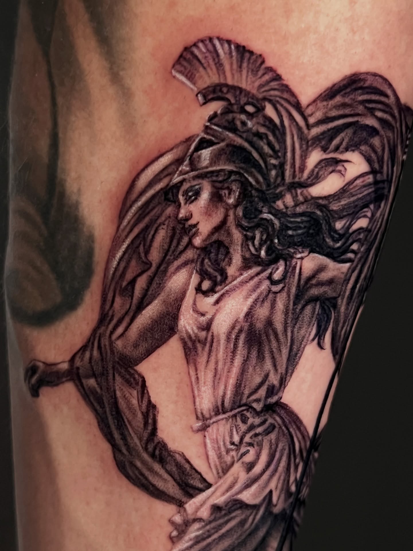 Angelic warrior realism tattoo on the forearm by Kitty