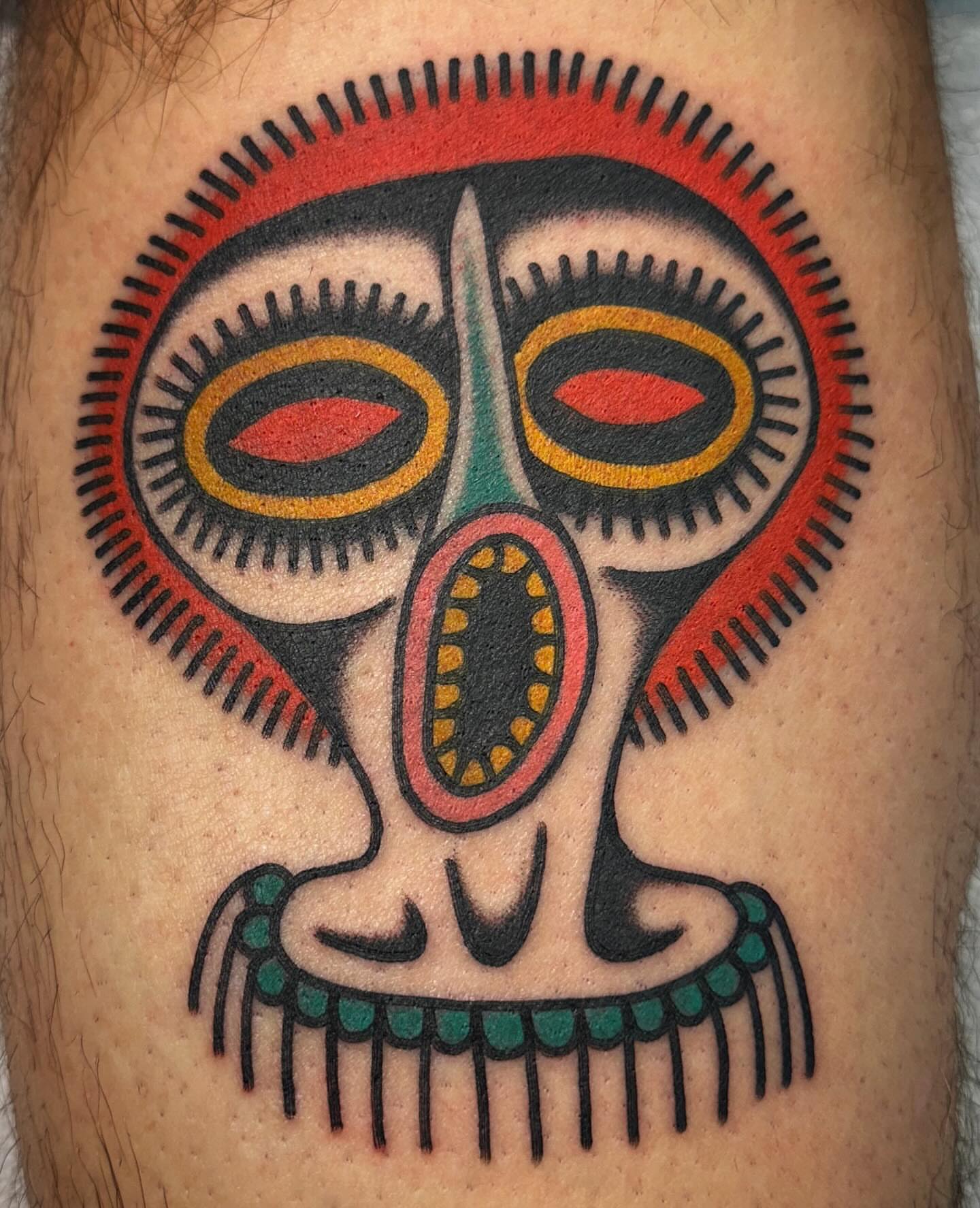 Mask American traditional tattoo on the thigh by Nathan Rohrbacher, Nashville, Tennessee
