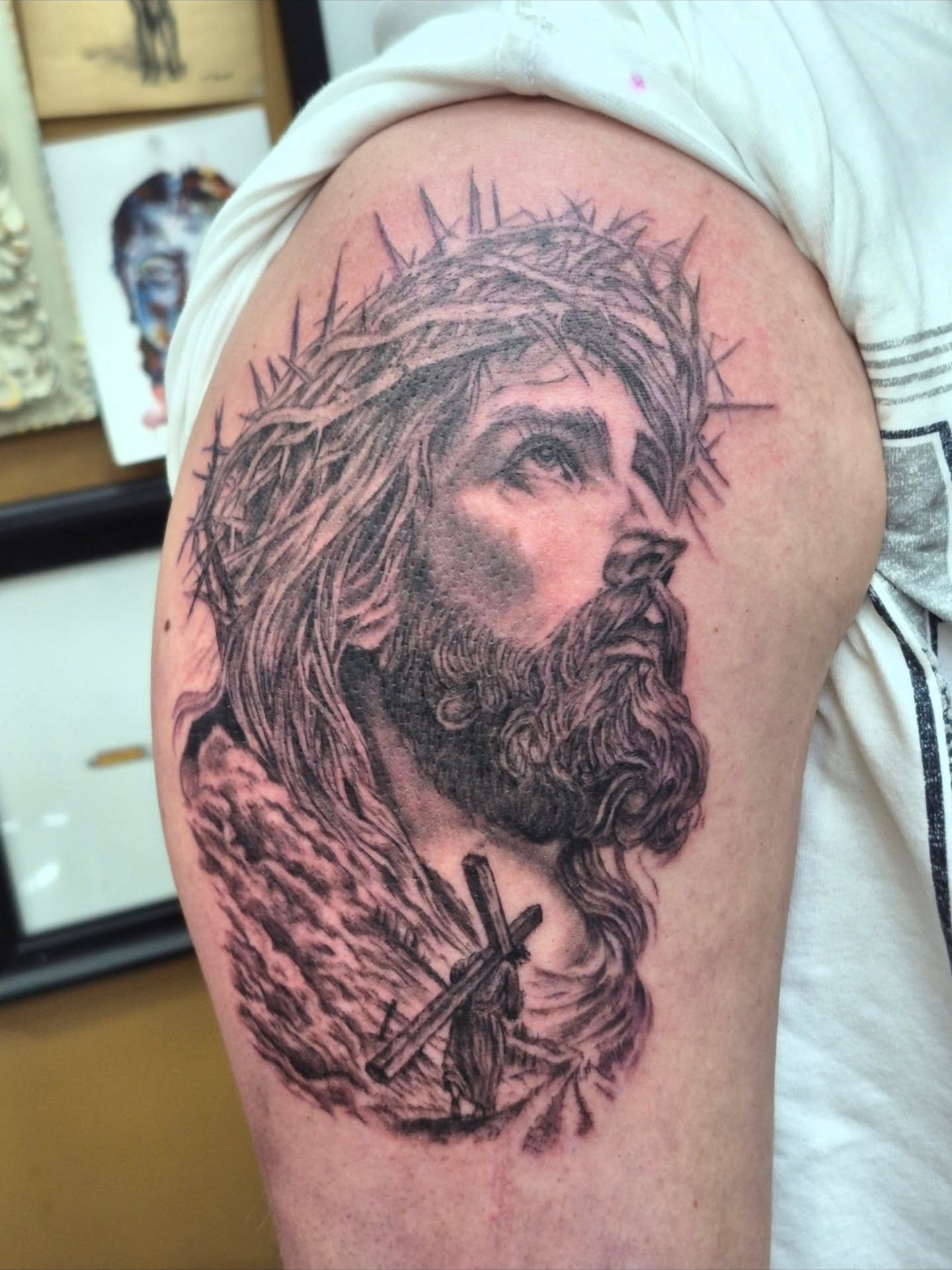 Jesus Christ realism tattoo on the shoulder by Chris Bell