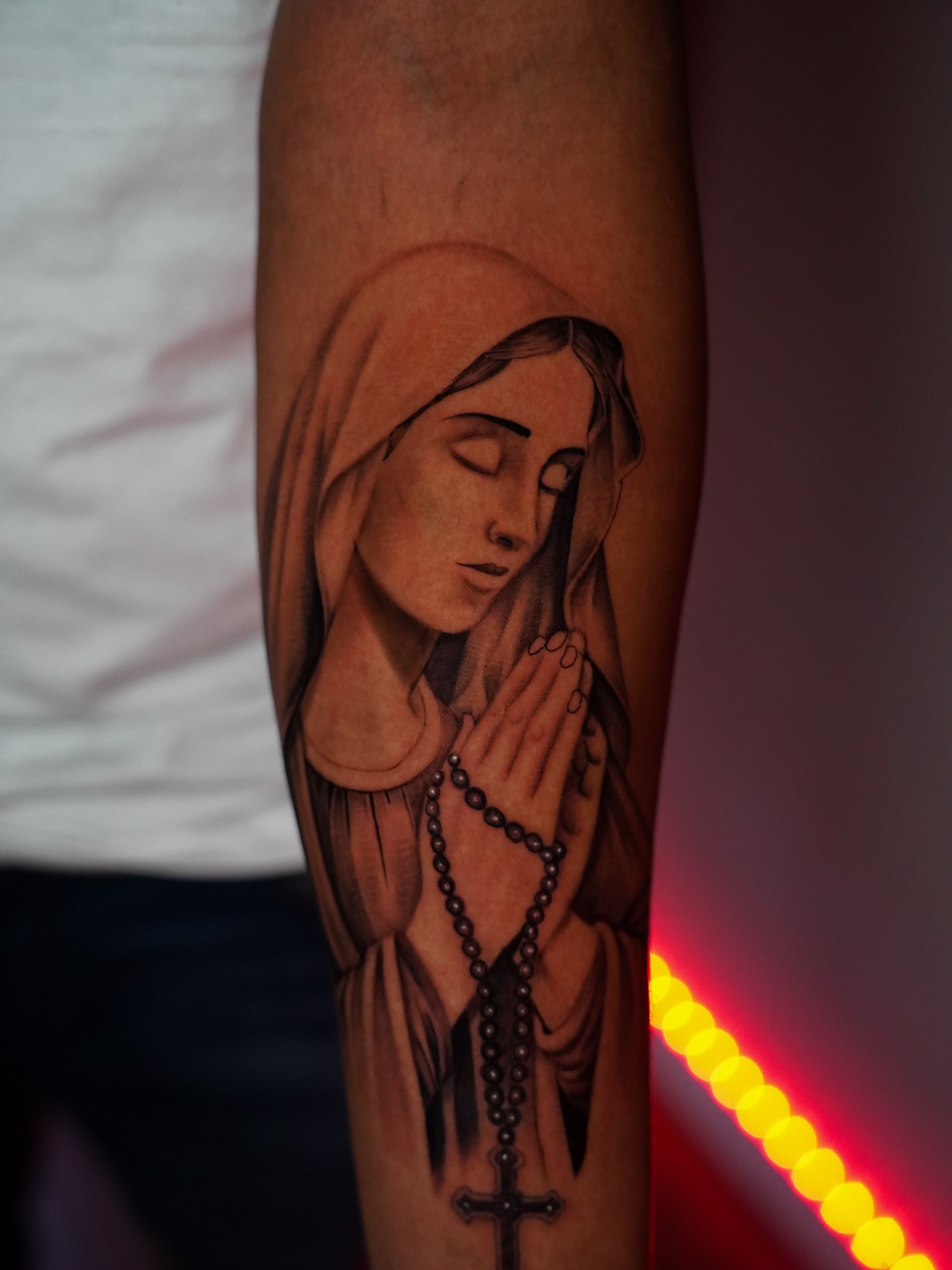 Praying woman realism tattoo on the forearm by Dallas Tattoo Artist