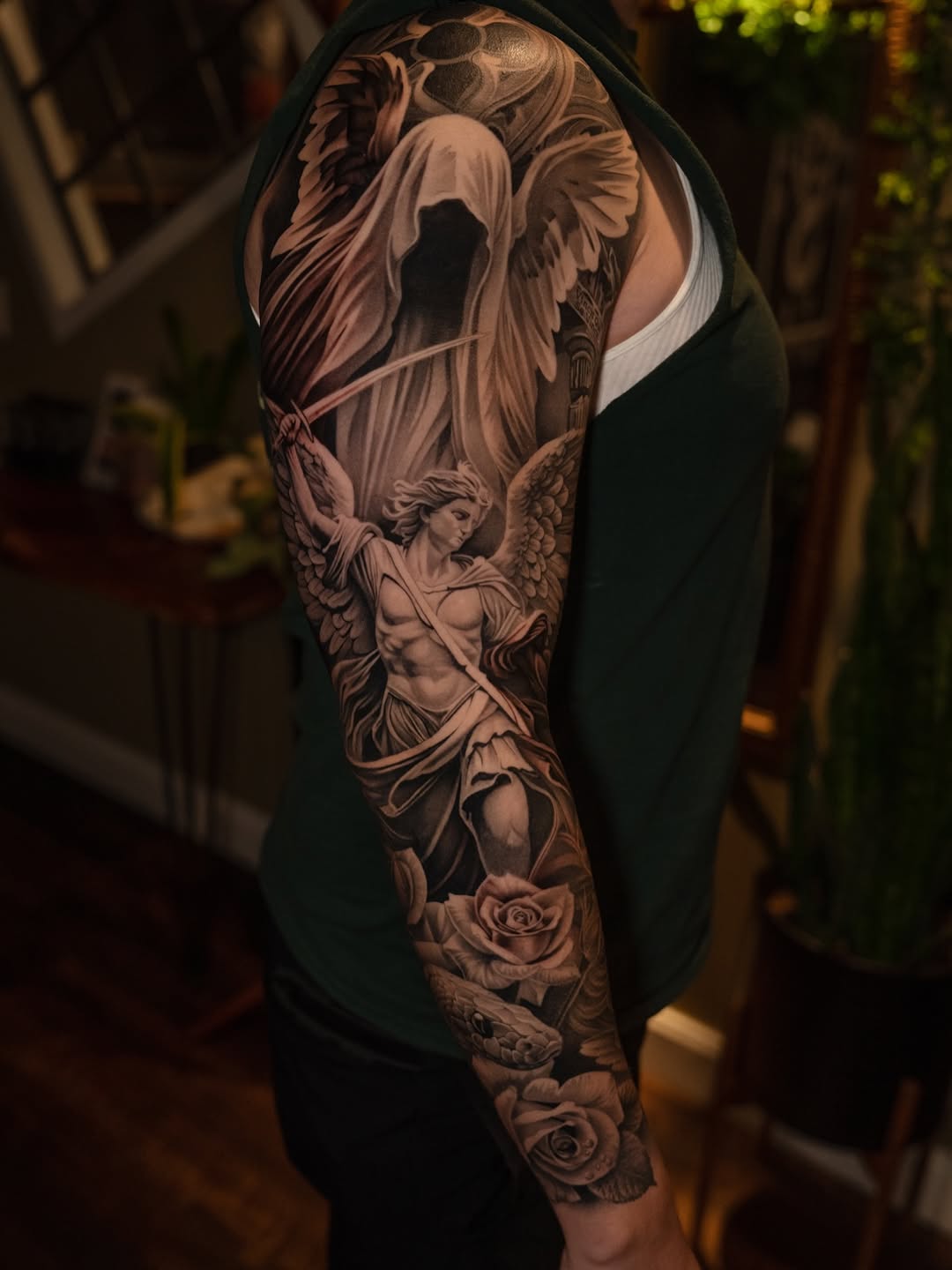 Realism tattoo on the upper arm by @kotytattoos