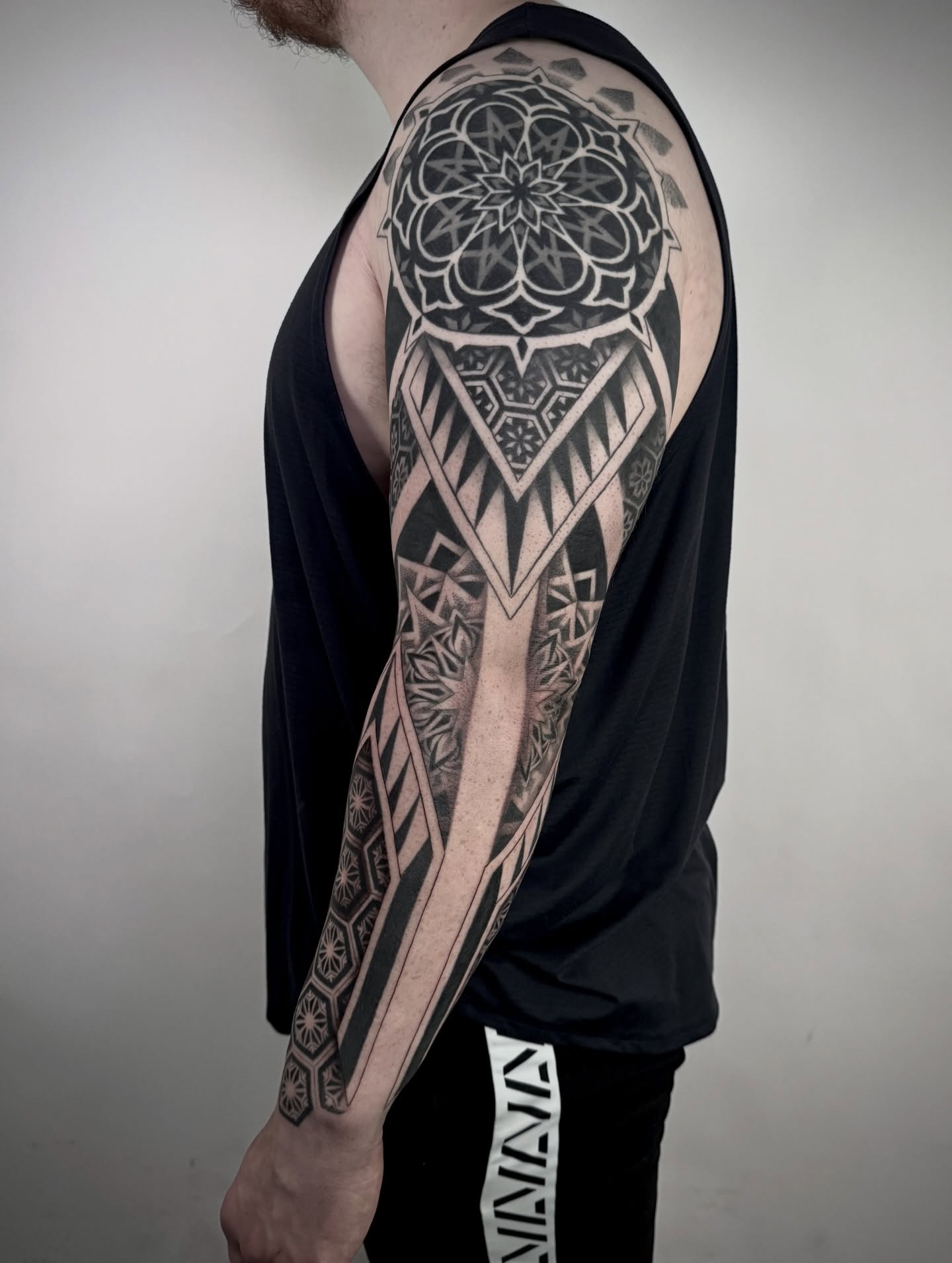 Tattoo by @ghostriverart — black_and_grey, geometric