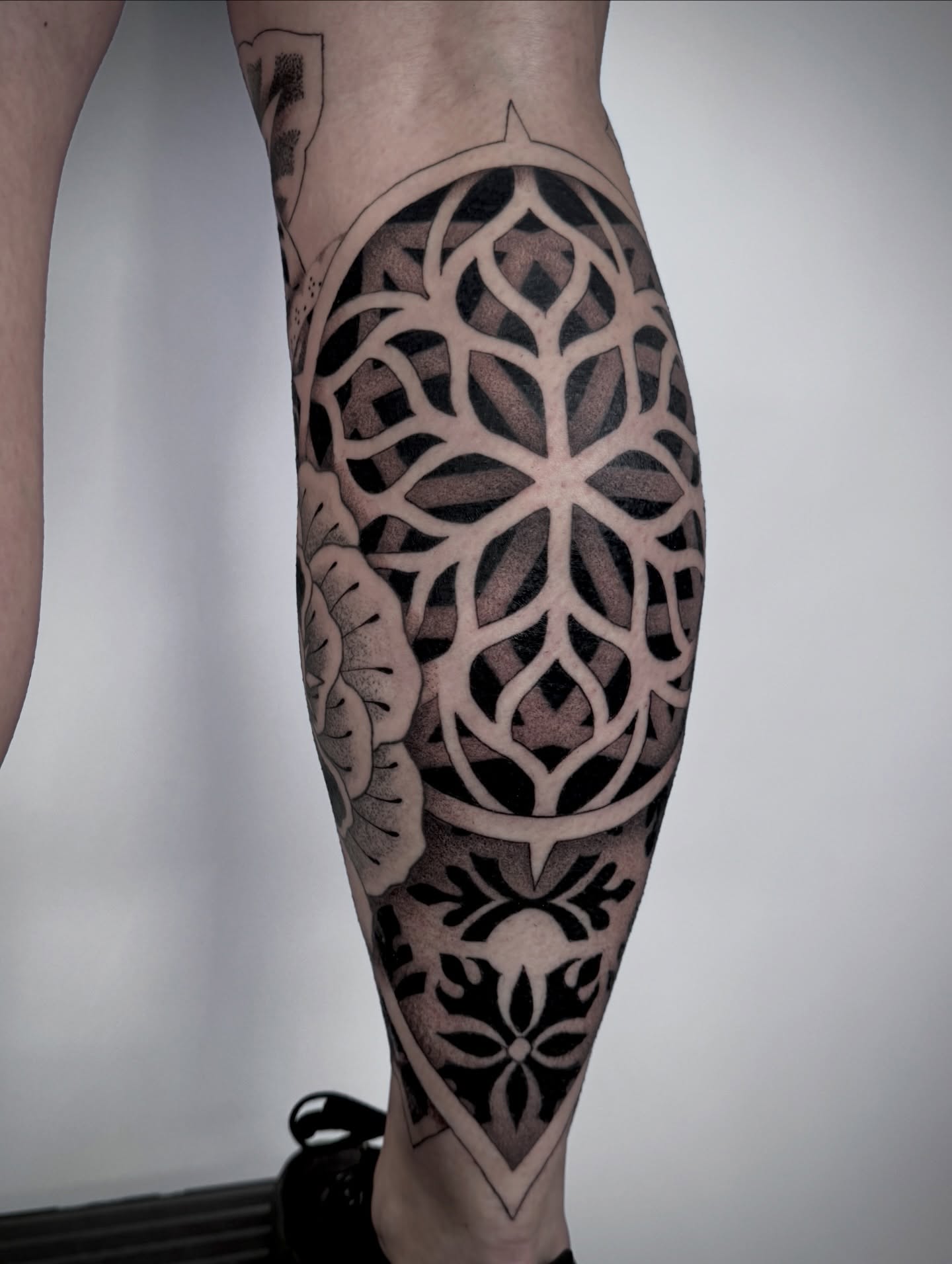 Geometric pattern geometric tattoo on the calf by Christine Hendricks, Denver, Colorado