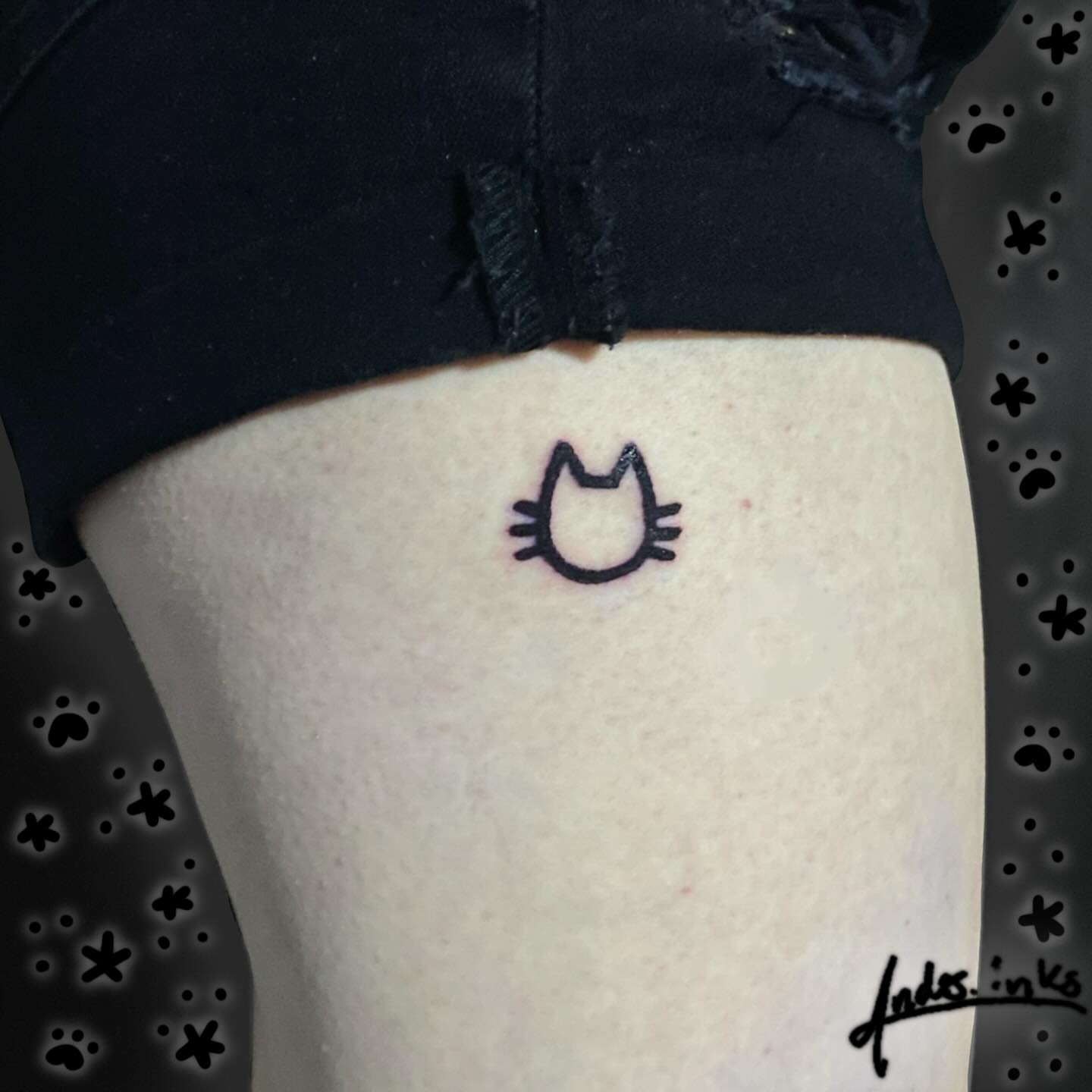 Cat silhouette minimalist tattoo on the forearm by ande