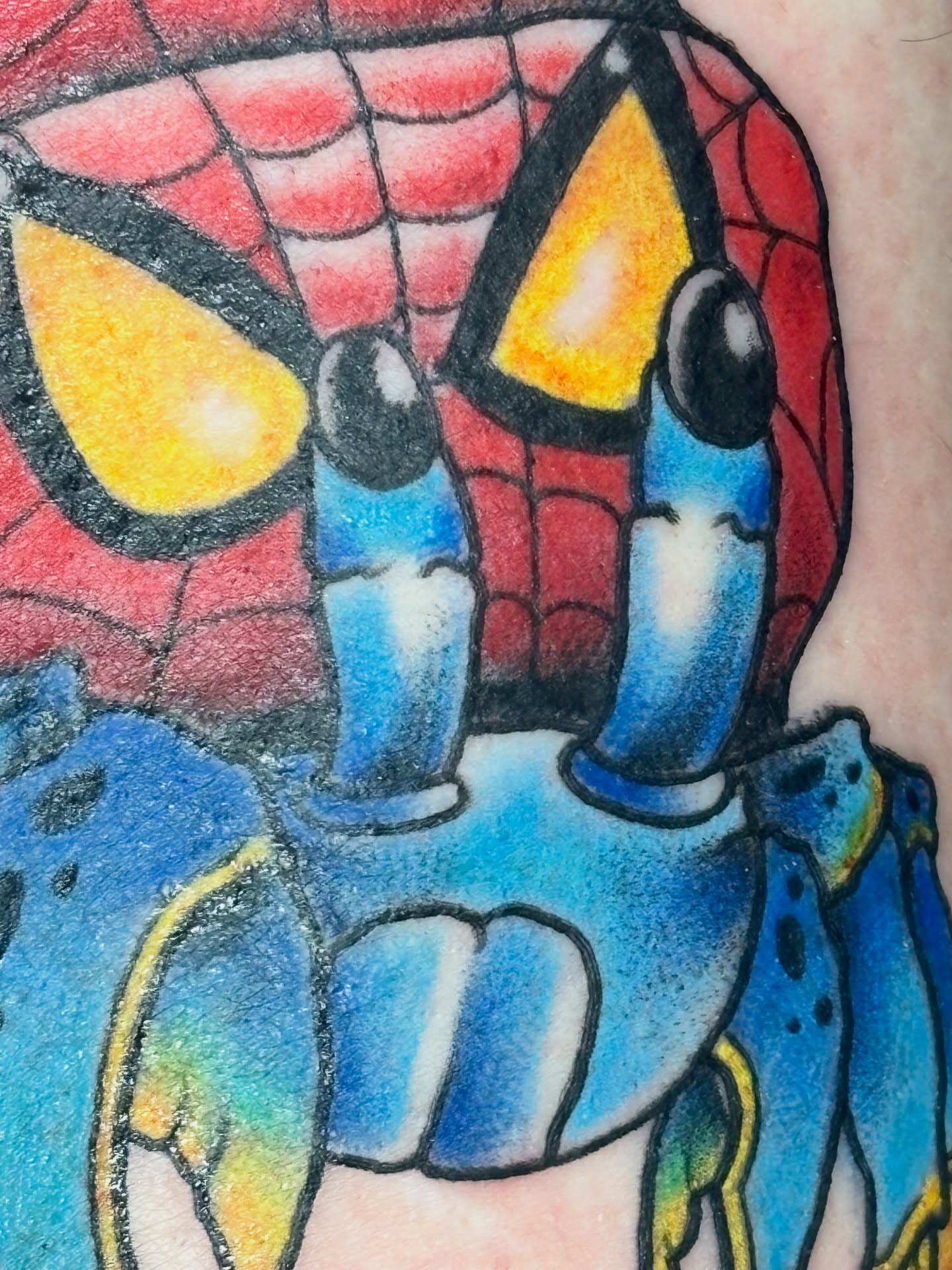 Spider-man new school tattoo on the forearm by Ares Rhodes