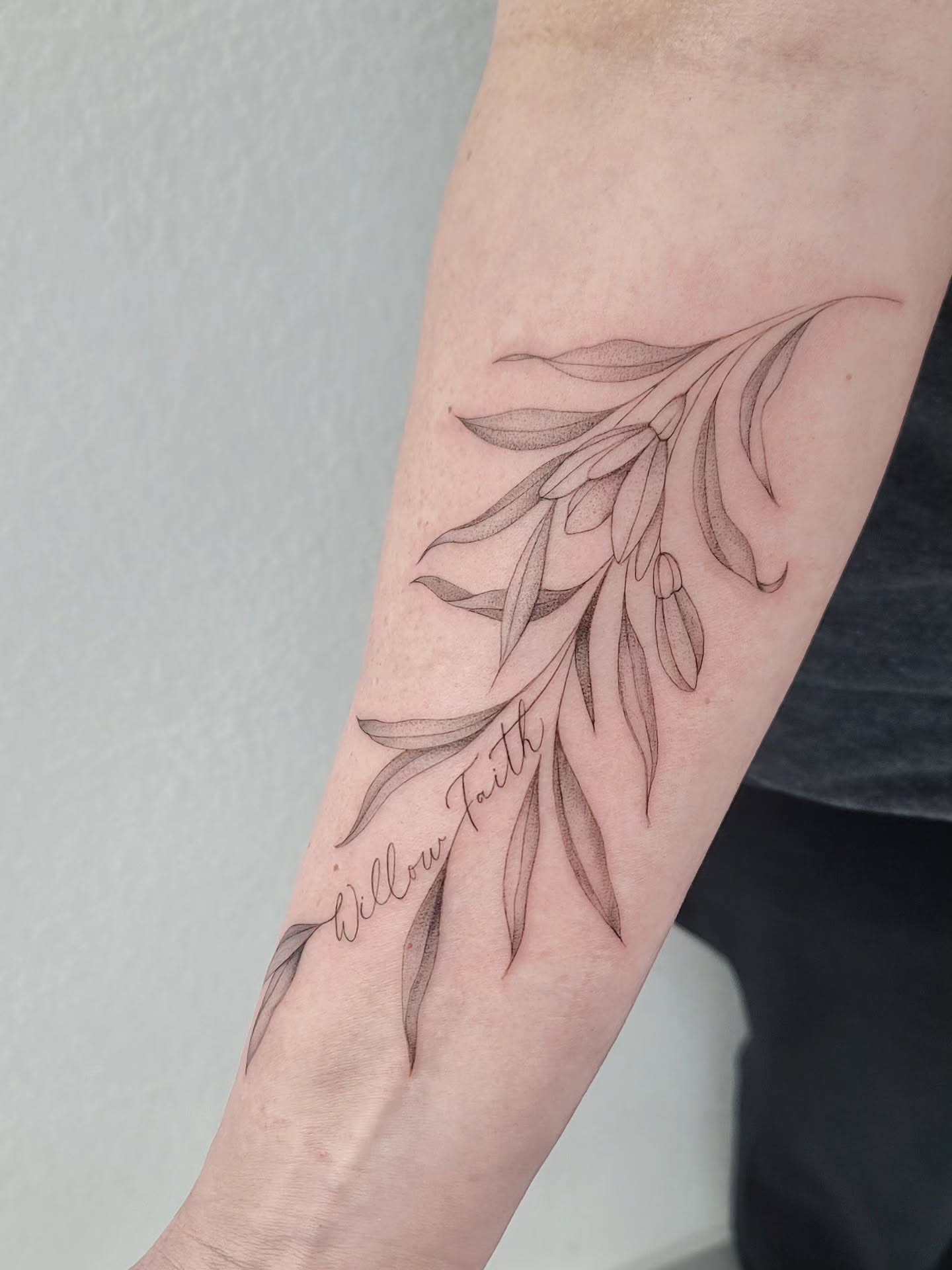 Willow branch black and grey tattoo on the forearm by Las Vegas Fine Line Tattoos