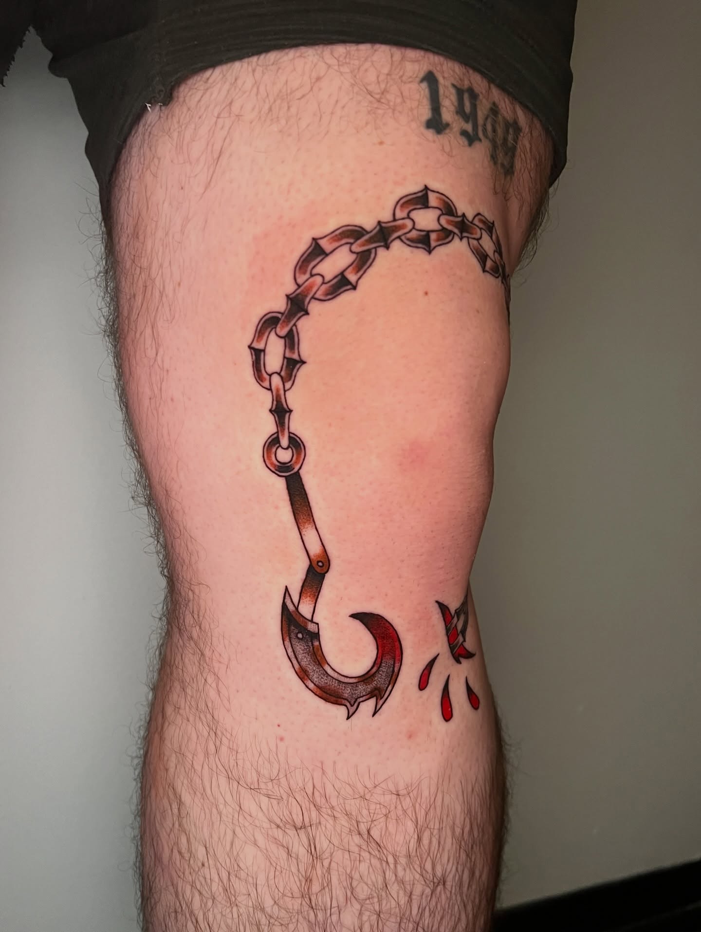 Hook and chain American traditional tattoo on the thigh by AJ π°π· LA tattoo