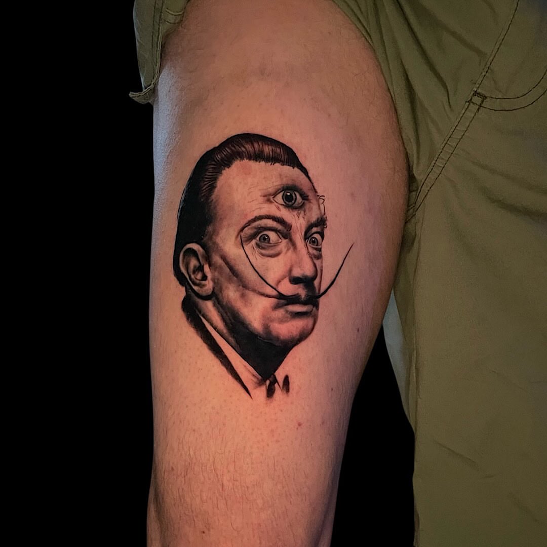 Salvador dali realism tattoo on the forearm by Brooke Kresco