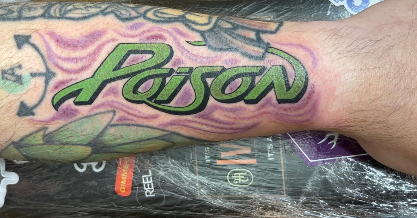 Poison lettering script tattoo on the forearm by Tattsruru