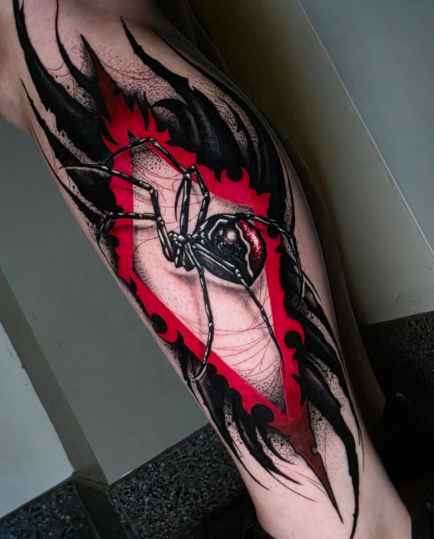 Spider blackwork tattoo on the forearm by Kelsey Lorrae, Ankeny, Iowa