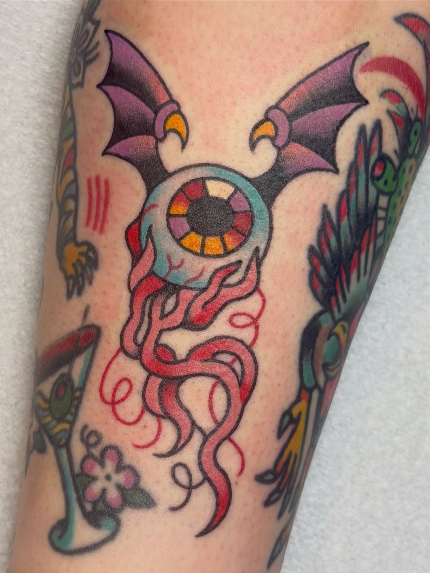 Eye with tentacles American traditional tattoo on the forearm by edith🌷, Murfreesboro, Tennessee