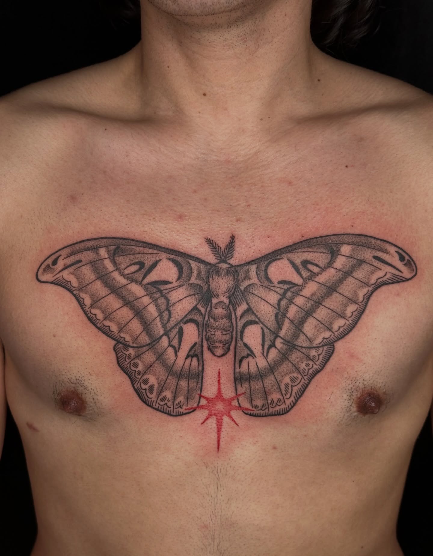 Butterfly black and grey tattoo on the chest by Summer Shield