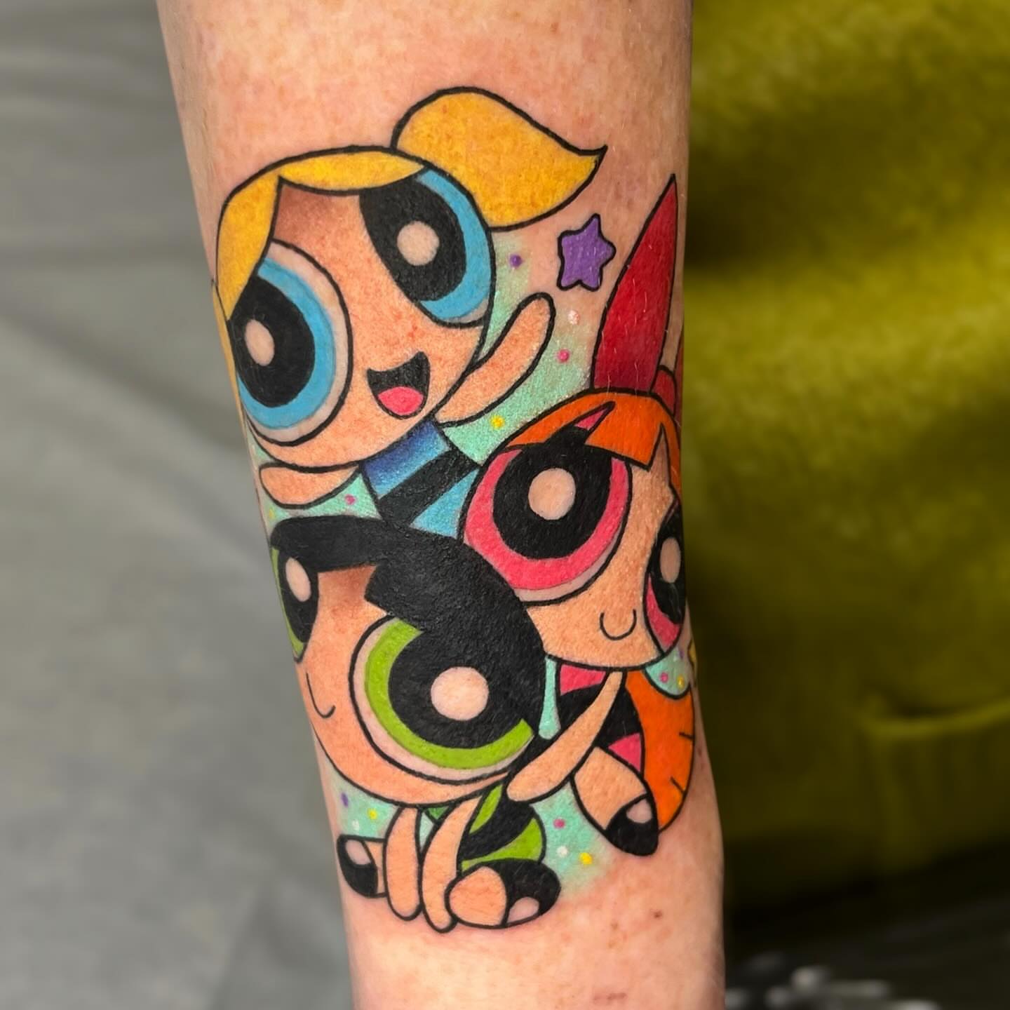 Powerpuff Girls dotwork tattoo on the forearm by Nicole Skalski