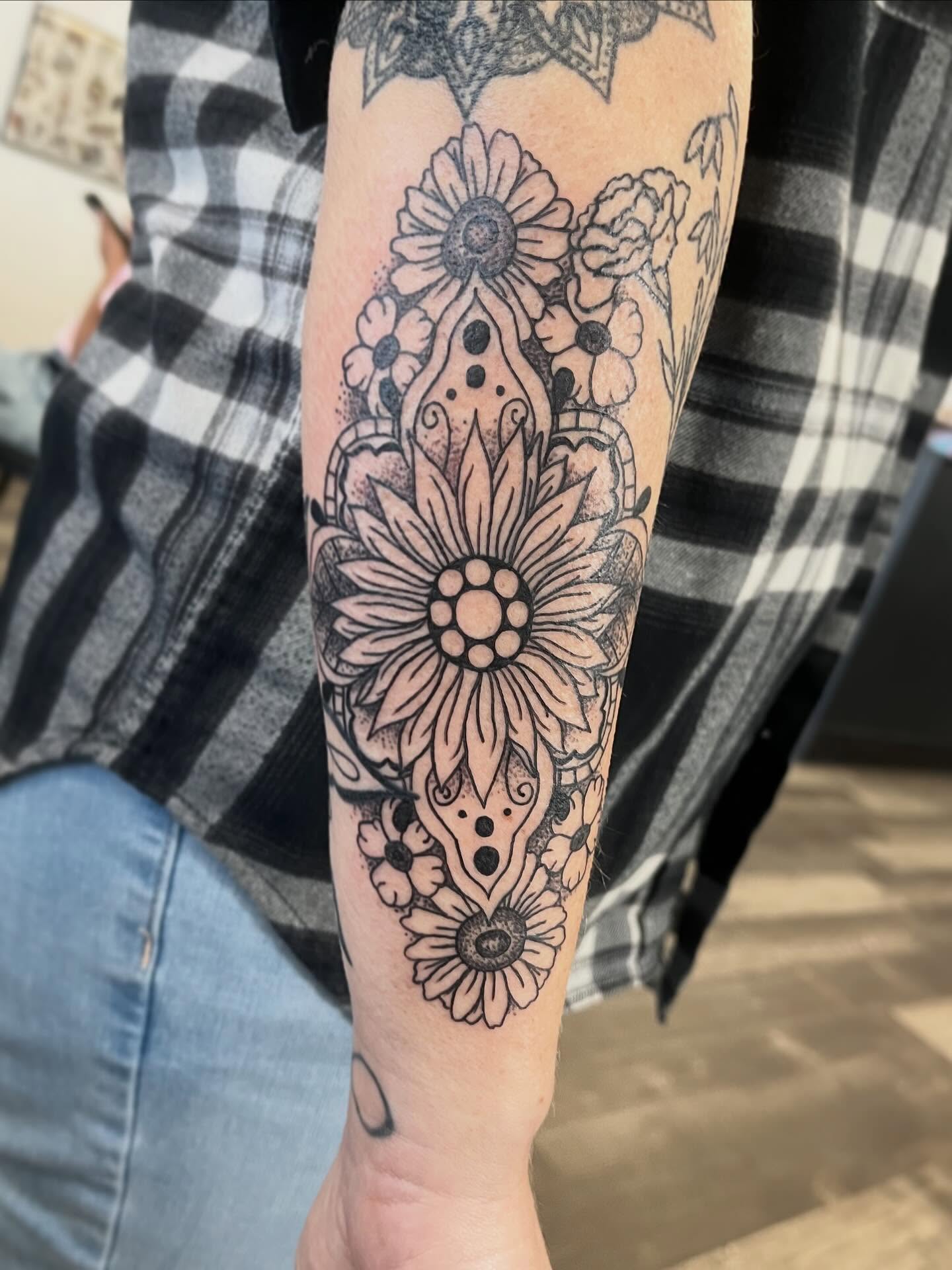 Floral mandala dotwork tattoo on the forearm by Hit & Run Tattoo, Dayton, Ohio