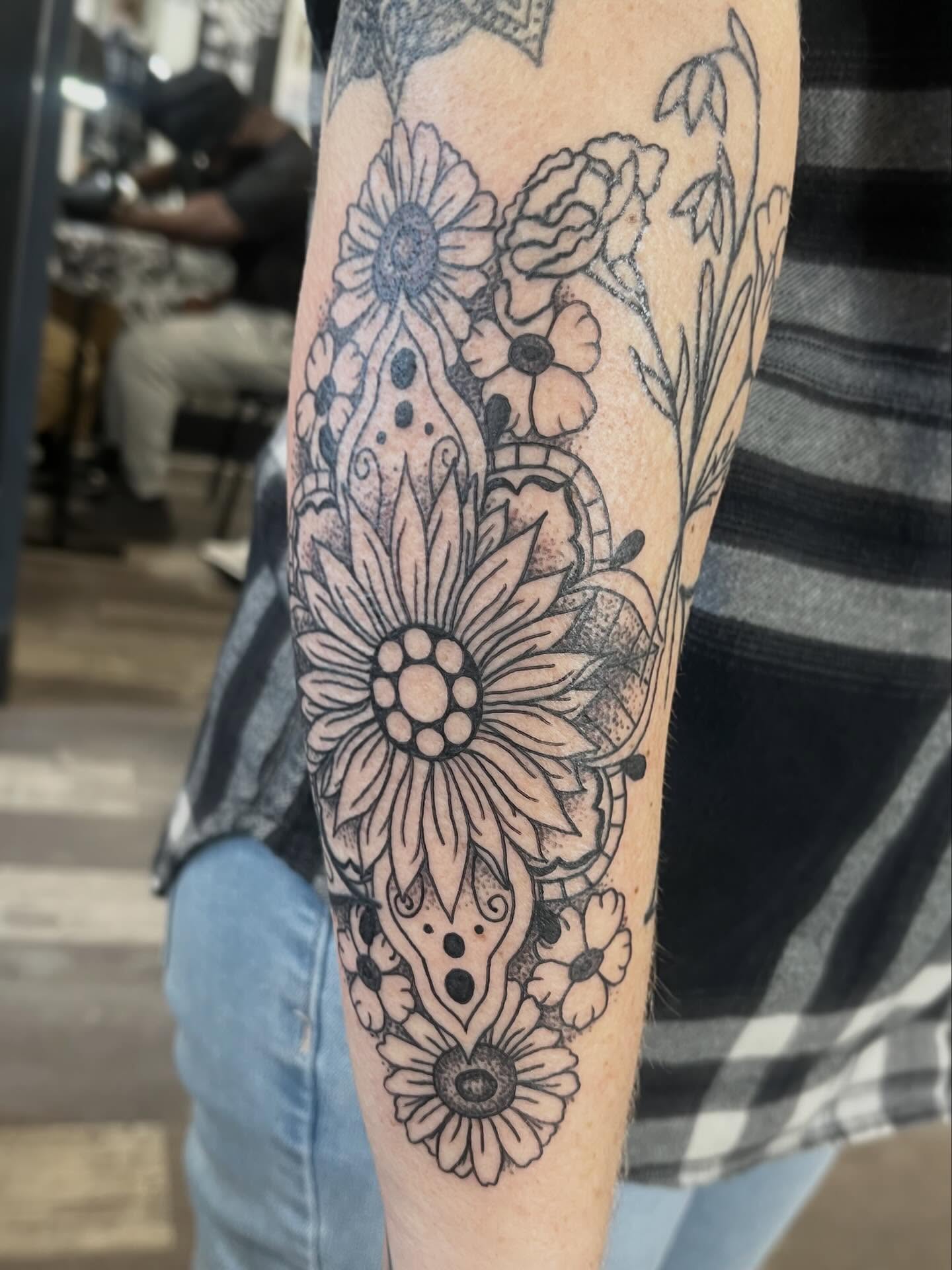 Floral mandala dotwork tattoo on the forearm by Hit & Run Tattoo, Dayton, Ohio