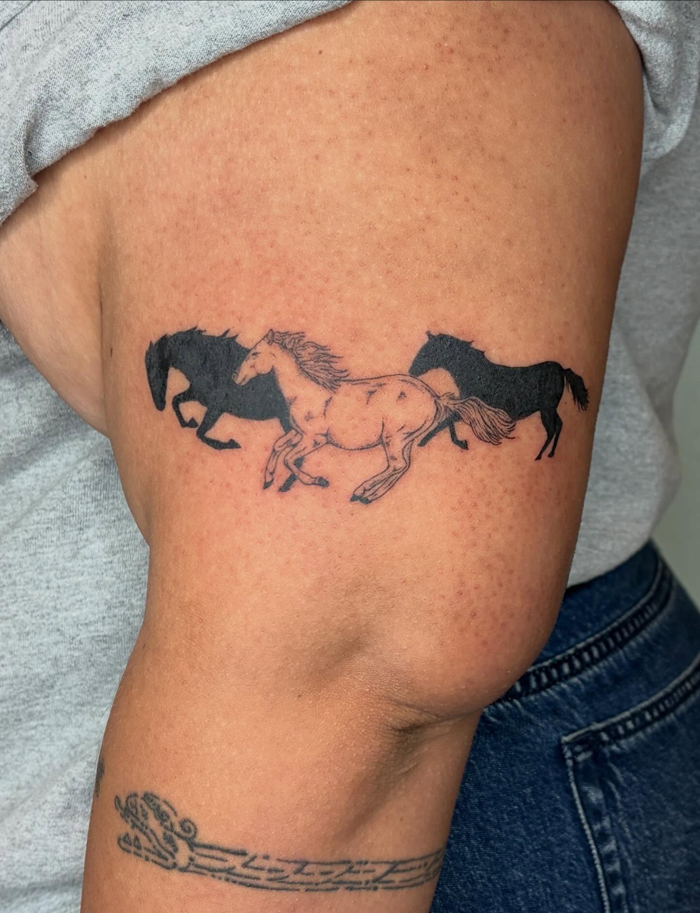 Horses black and grey tattoo on the thigh by alyssa doing tattoos