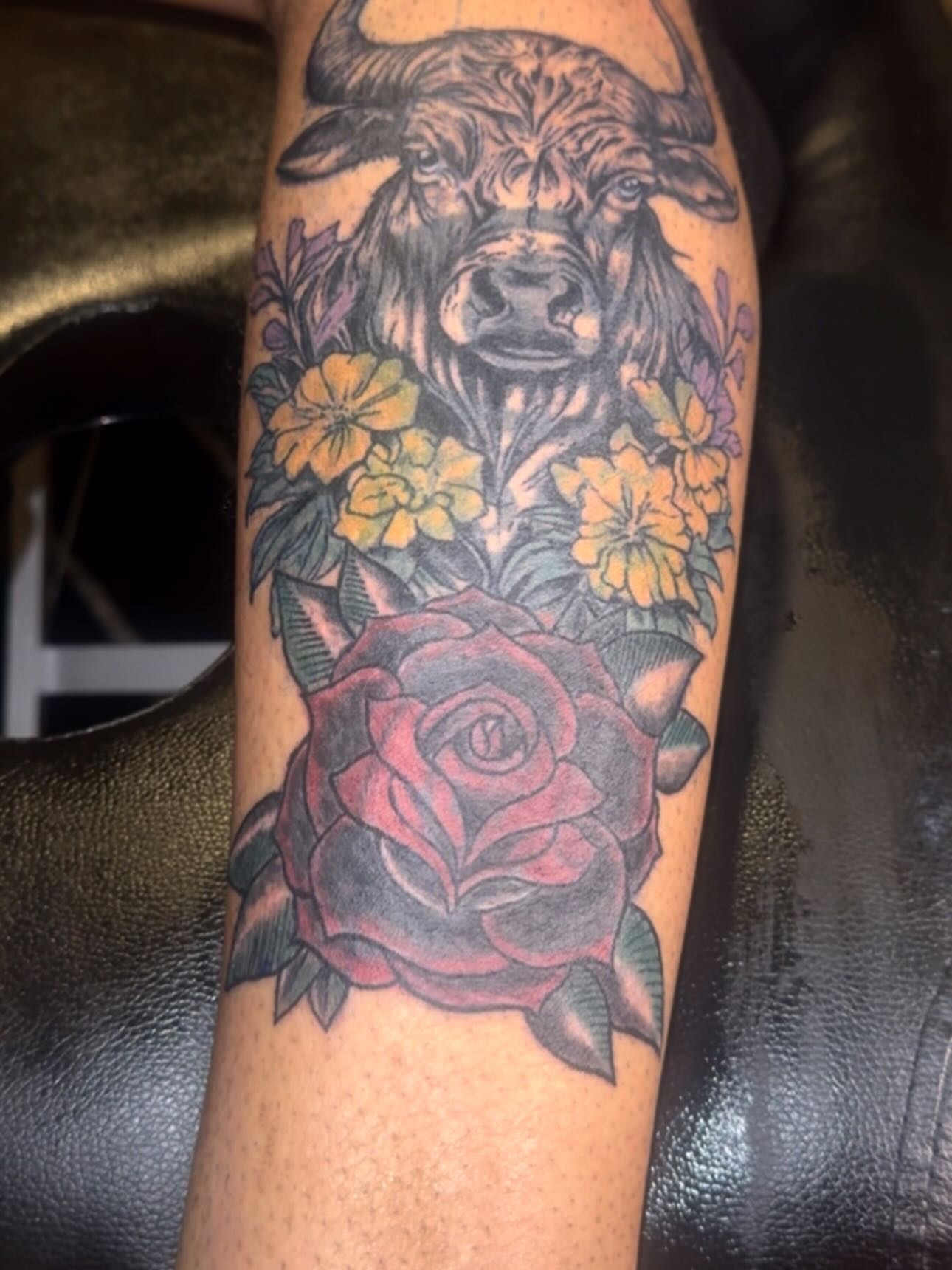 Bull and flowers American traditional tattoo on the forearm by Jihaad staley π¦, Charlotte, North Carolina