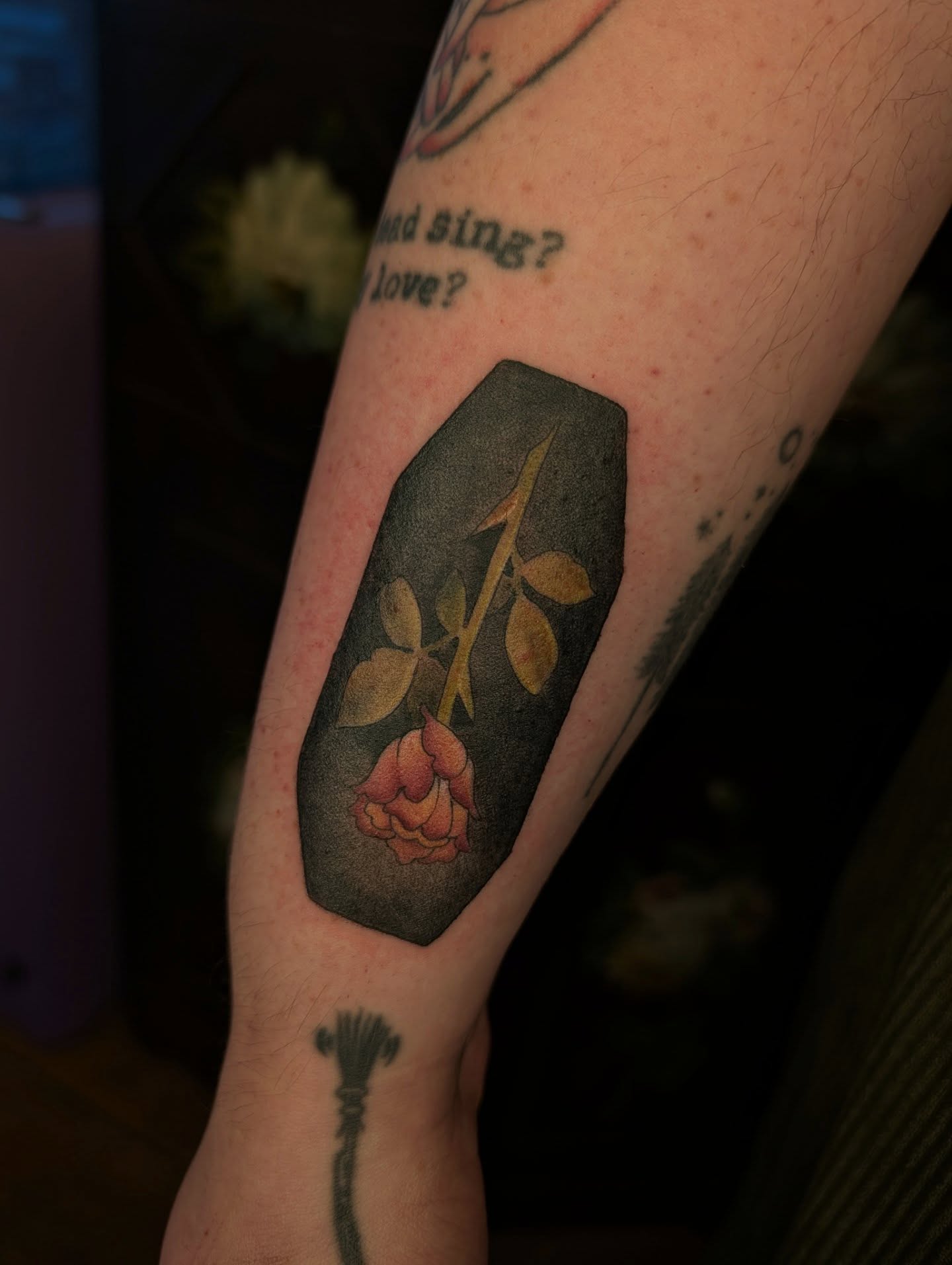 Rose and stem realism tattoo on the forearm by Jeanine, Providence, Rhode Island