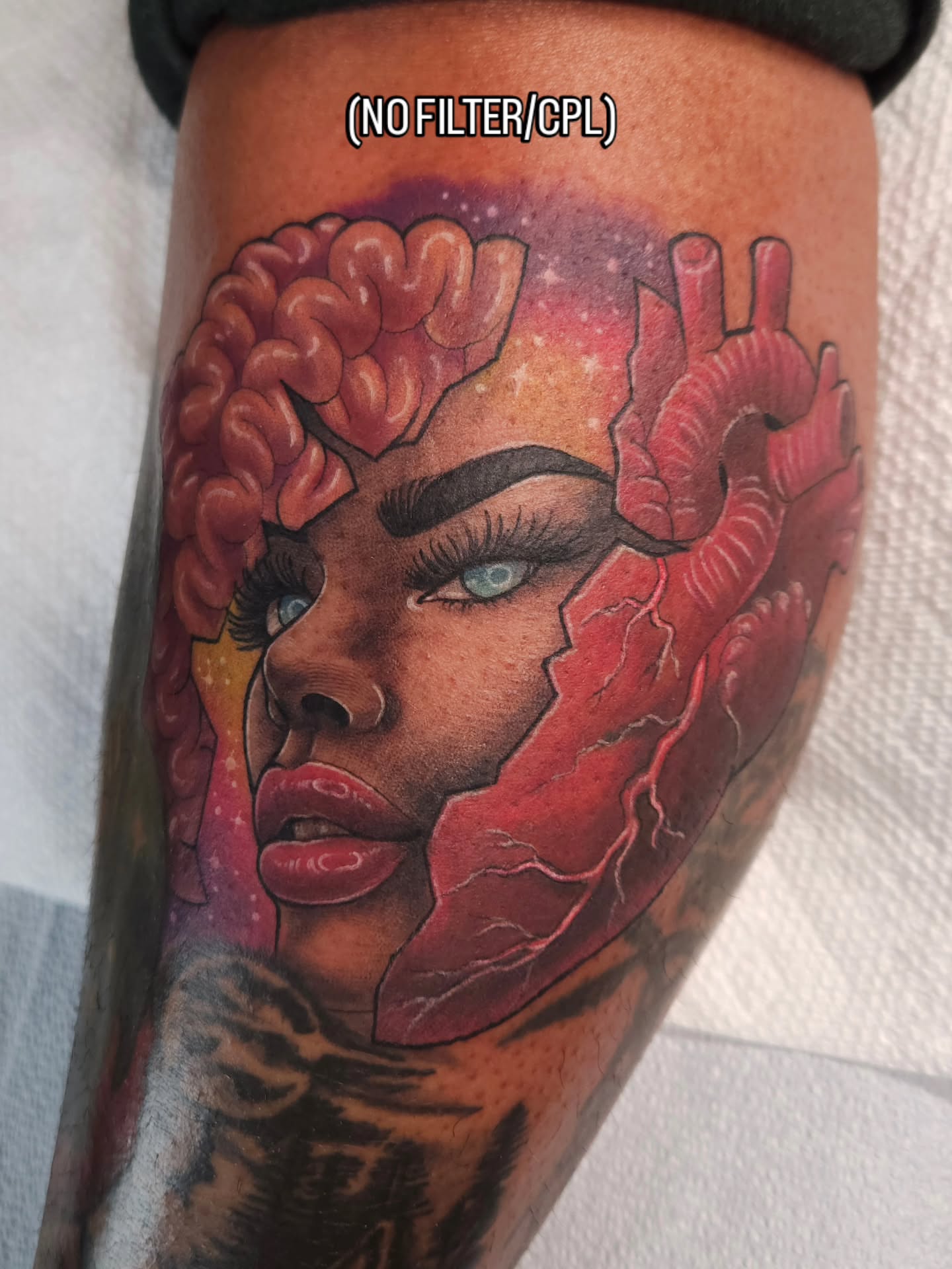Heart and woman realism tattoo on the forearm by ๐๐๐๐