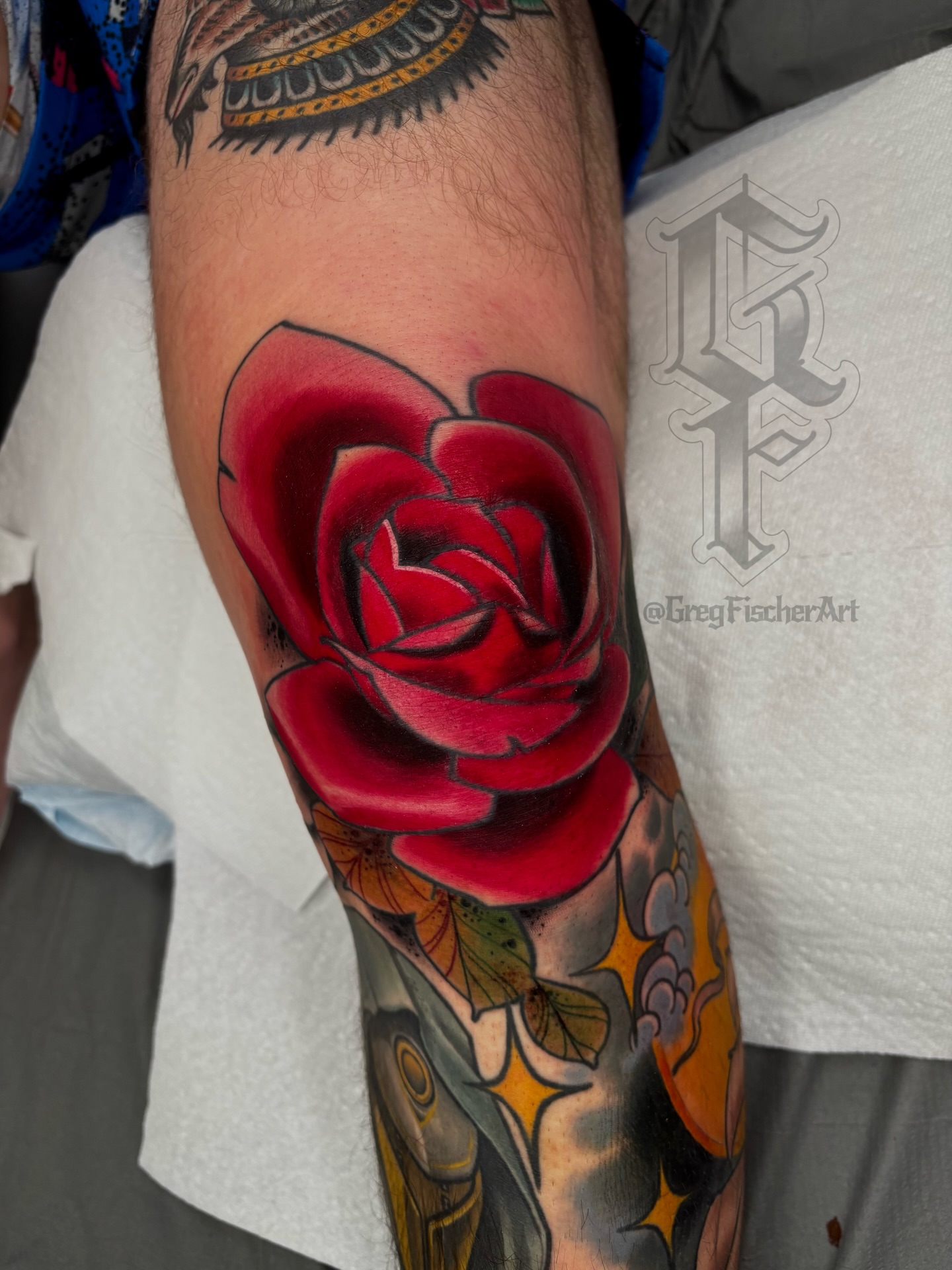 Red rose American traditional tattoo on the forearm by Greg Fischer