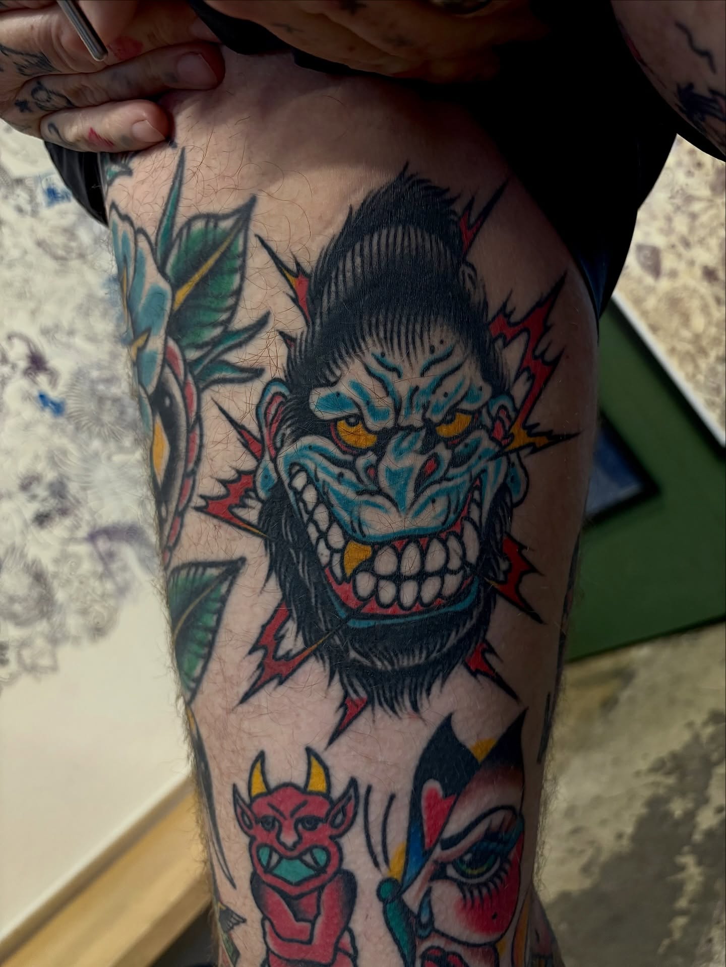 Demon head American traditional tattoo on the thigh by Dallas Tattoo Artist