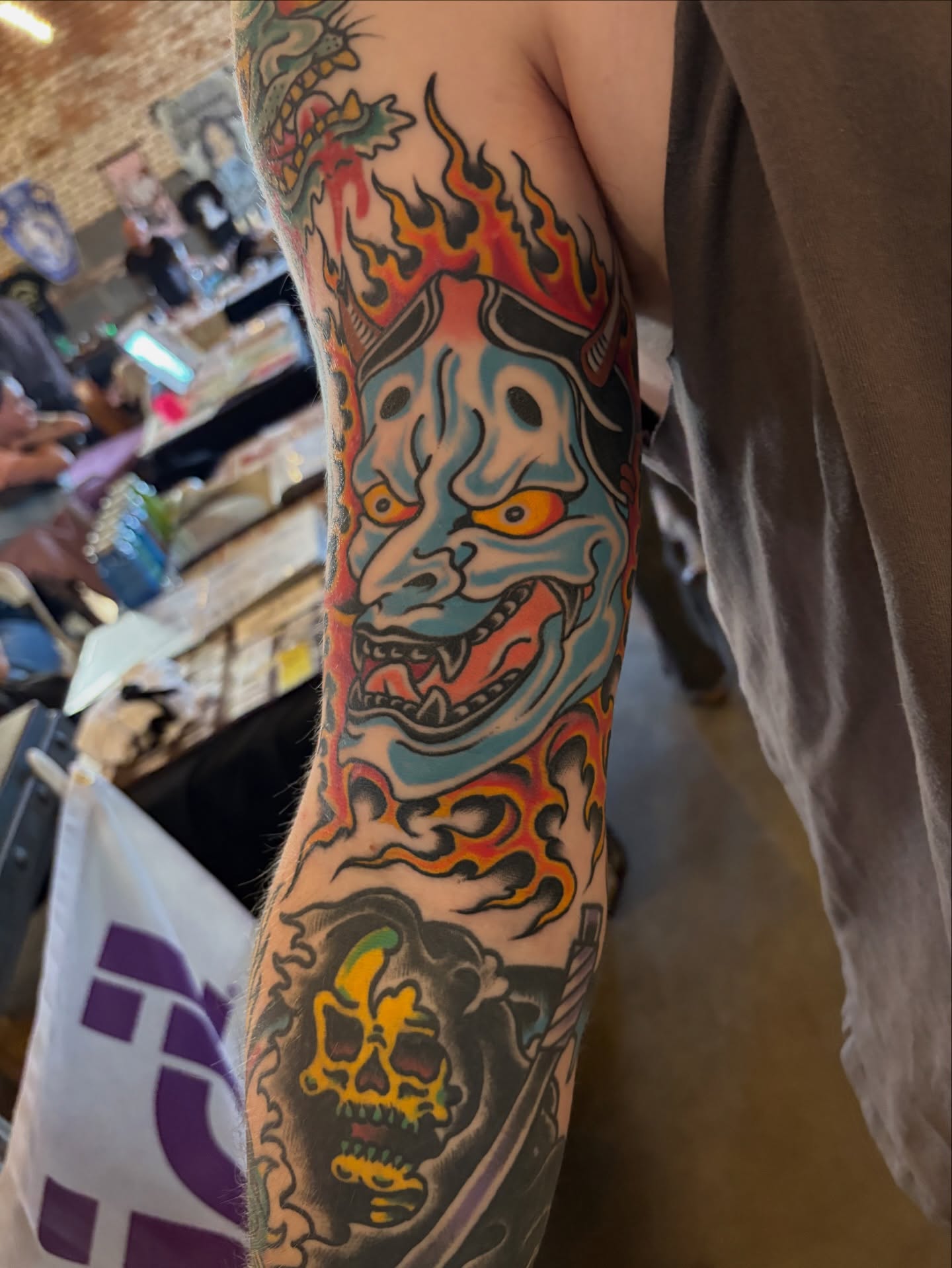 Japanese demon mask japanese irezumi tattoo on the forearm by Dallas Tattoo Artist