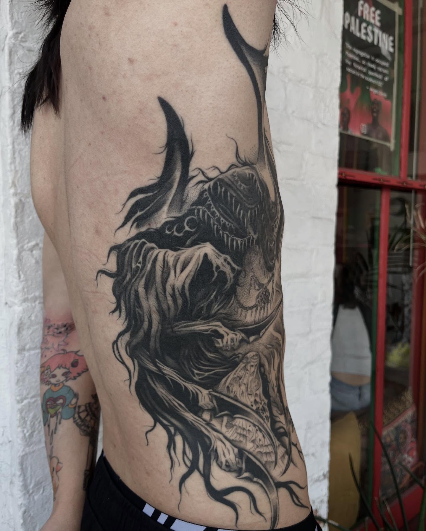 Demon dark realism tattoo on the thigh by April Jay