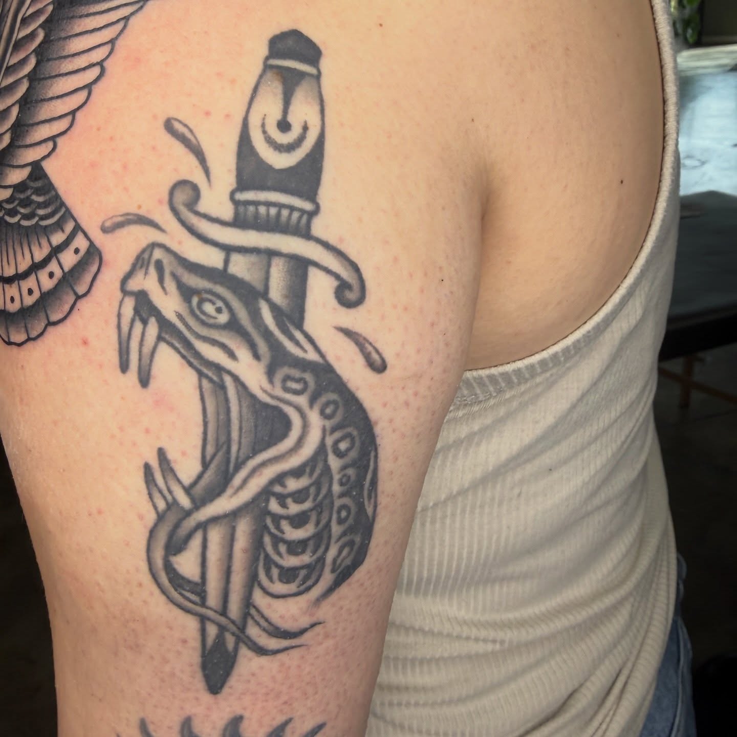 Snake and dagger black and grey tattoo on the thigh by @chrisskon, Carpentersville, Illinois