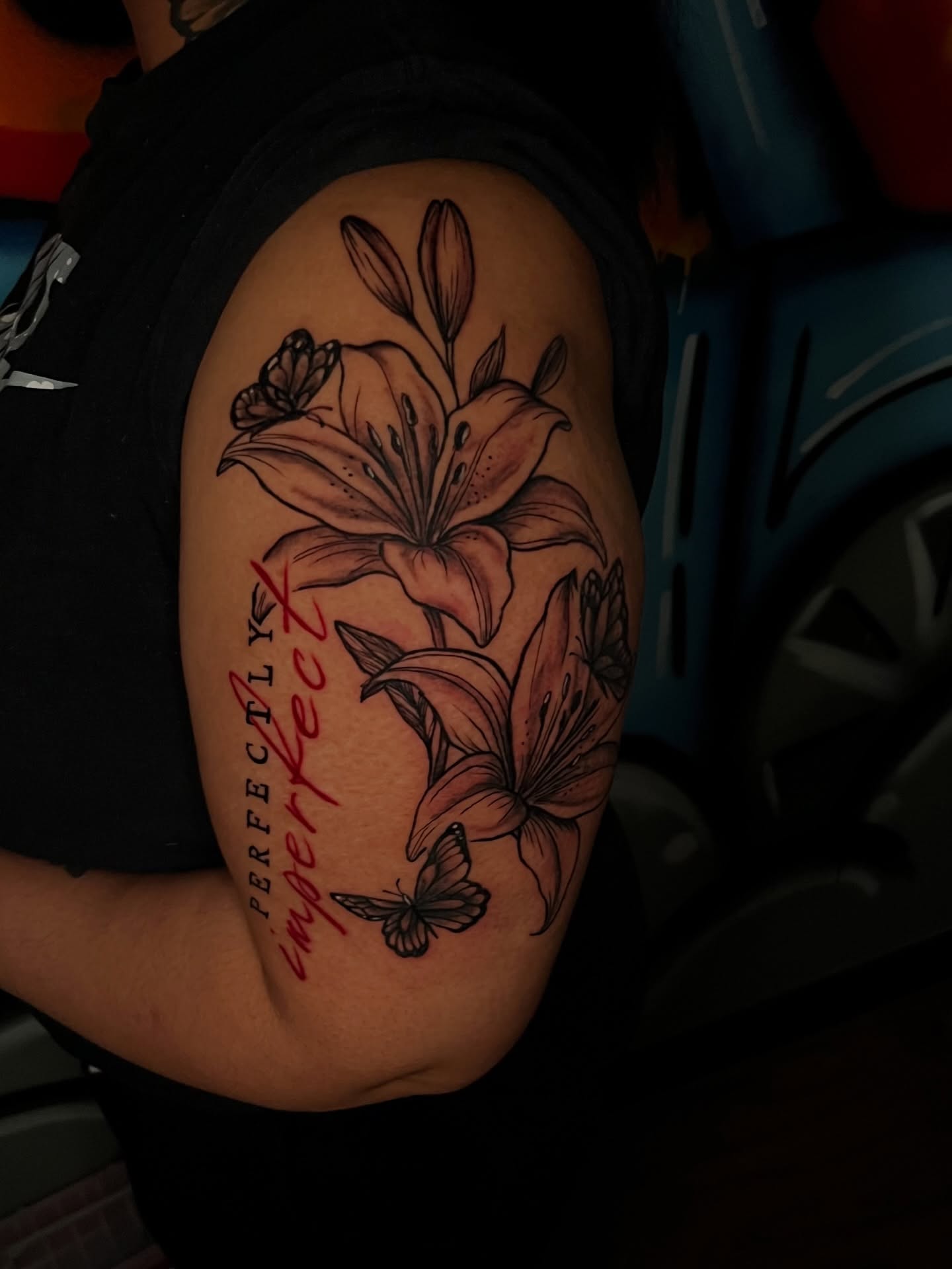 Lilies and butterflies realism tattoo on the shoulder by Unknwn Ink ⭐️