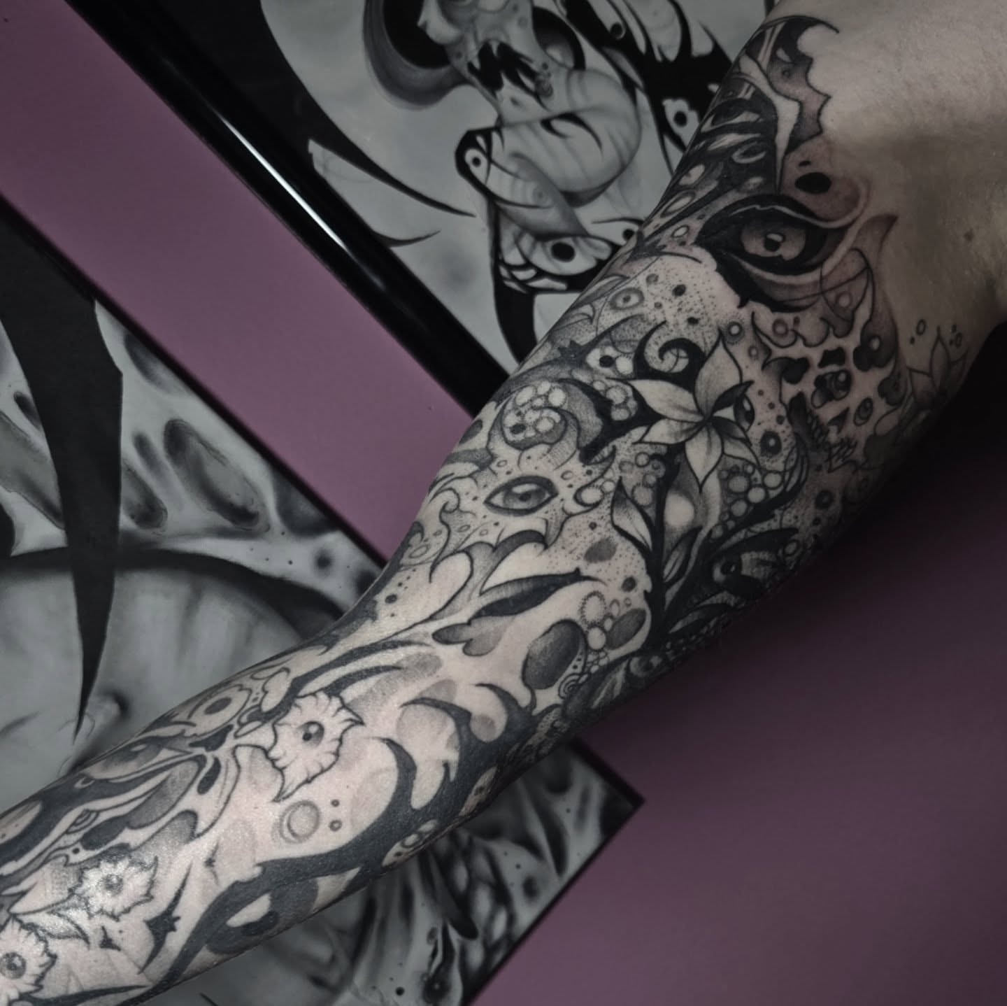 Floral and abstract patterns dotwork tattoo on the forearm by Ema Fish