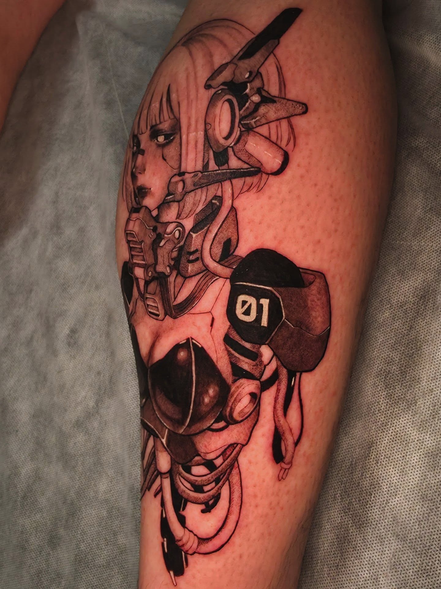 Mecha girl anime tattoo on the forearm by Johnathan Nguyen