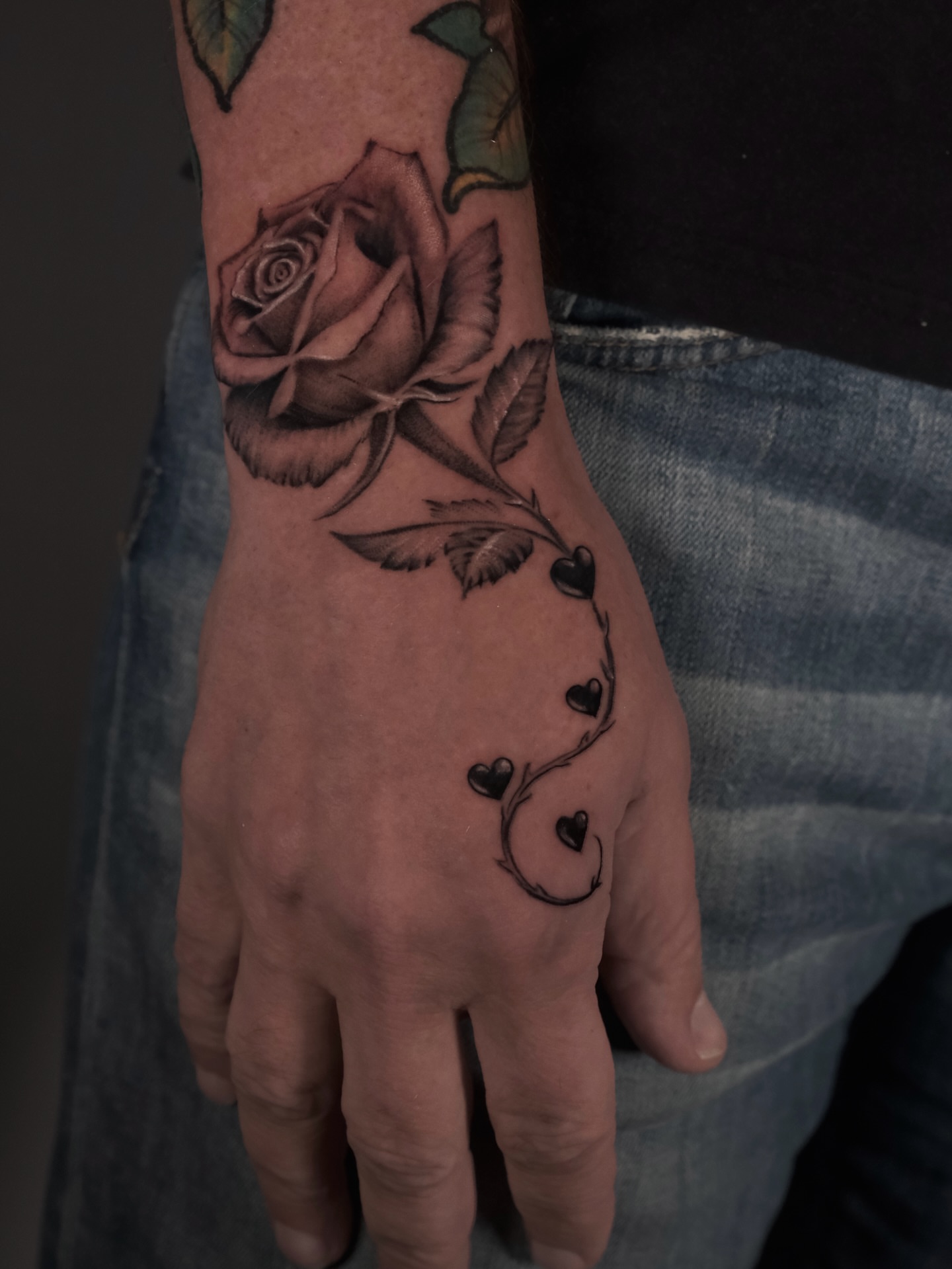 Rose and hearts black and grey tattoo on the hand by AL 777, Denton, Texas