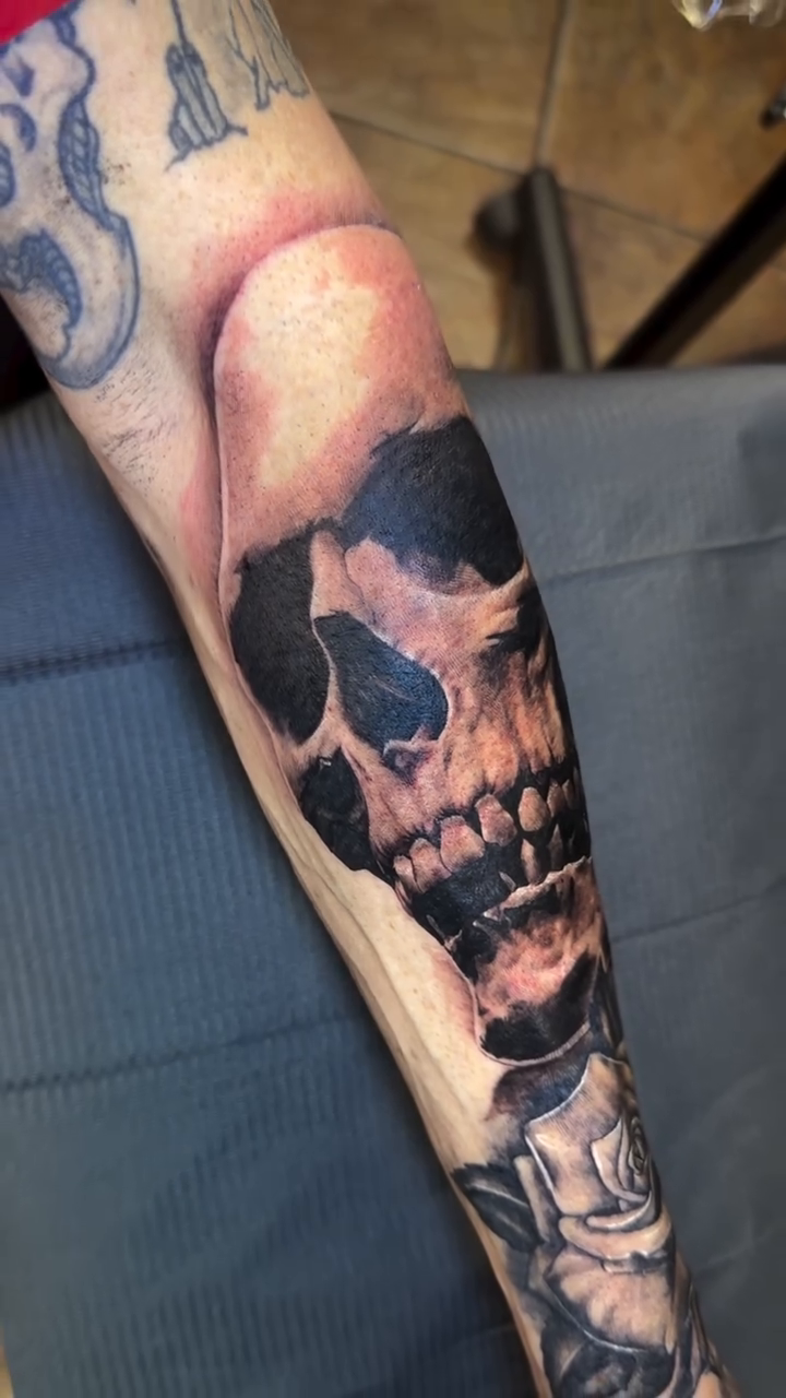 Tattoo by @villionairetattoos — dark_realism, black_and_grey