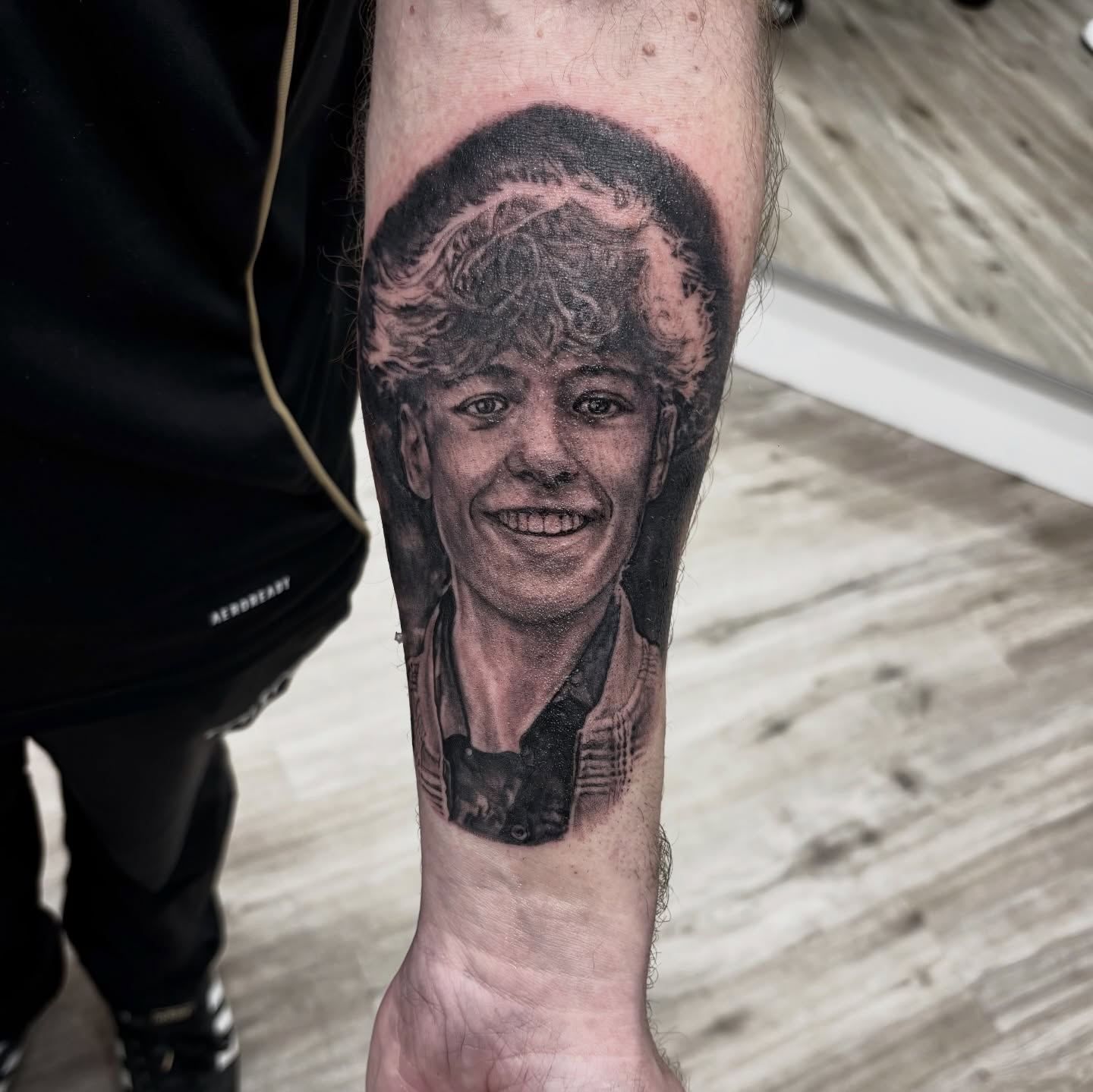 Portrait realism tattoo on the forearm by Ruth Ormsby-Ashworth