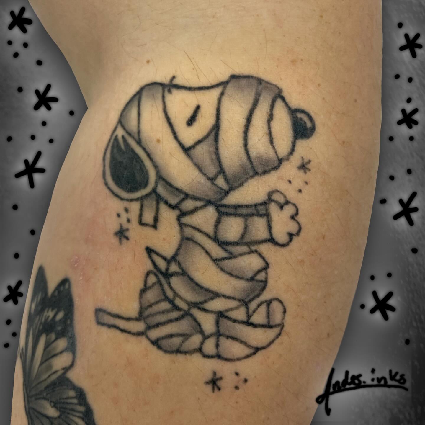 Mummy dog black and grey tattoo on the forearm by ande