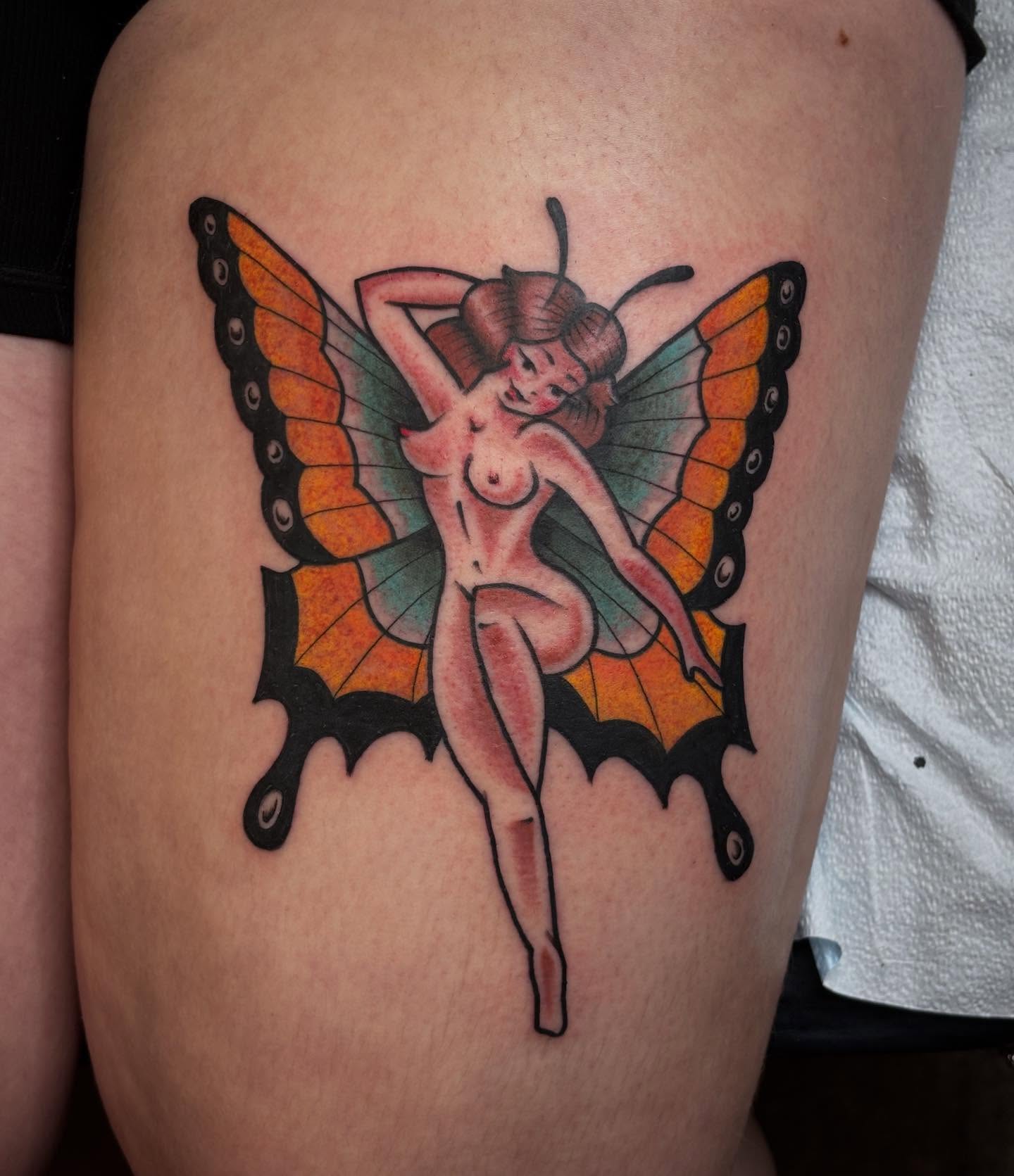 Fairy with butterfly wings American traditional tattoo on the thigh by Brandi ⛓, Detroit, Michigan