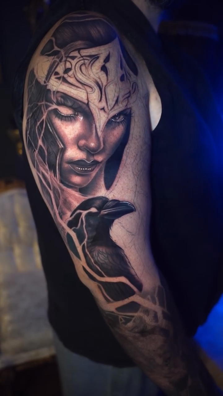 Woman and raven realism tattoo by Cristian Rodriguez