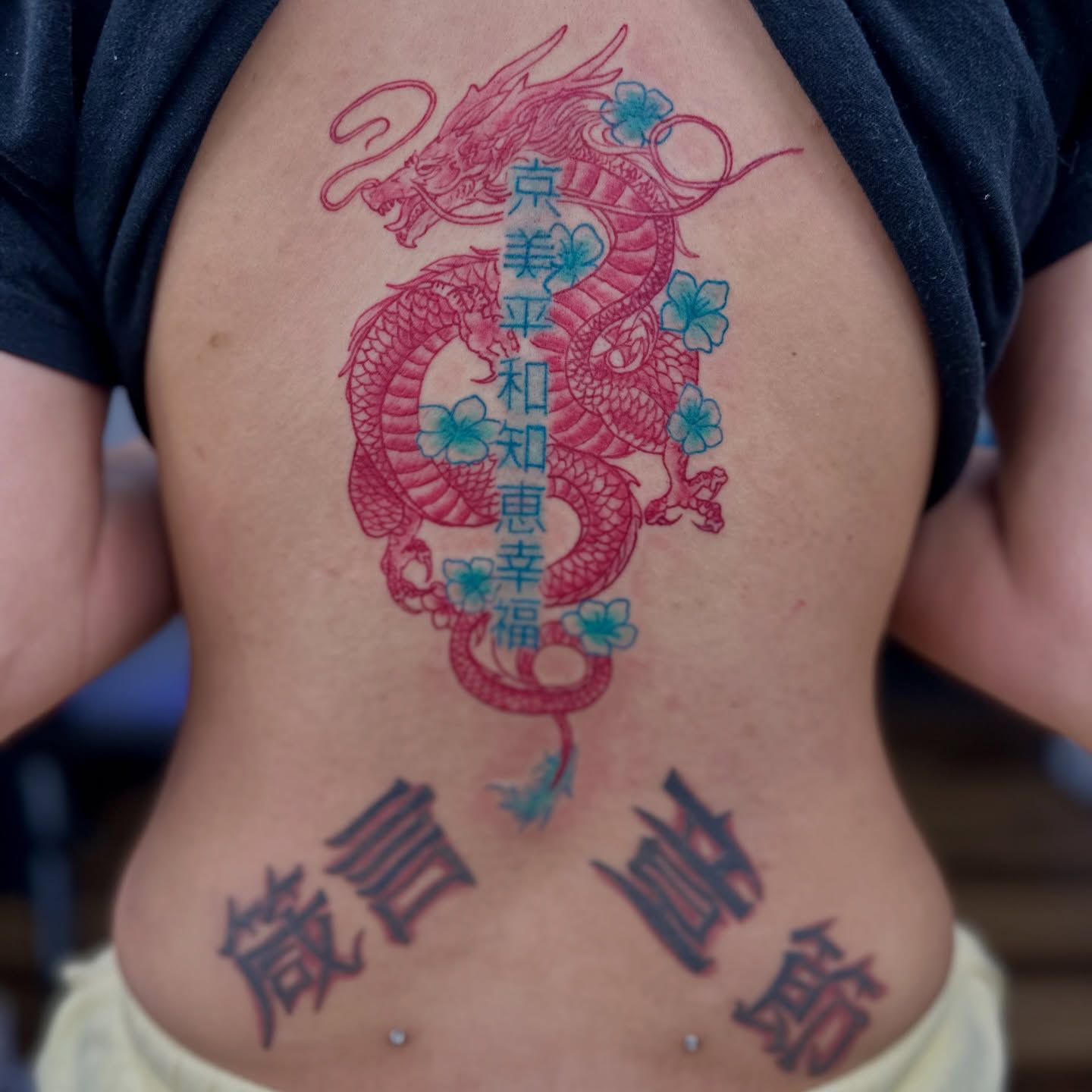 Dragon and flowers japanese irezumi tattoo on the ribs by Sk Pierce